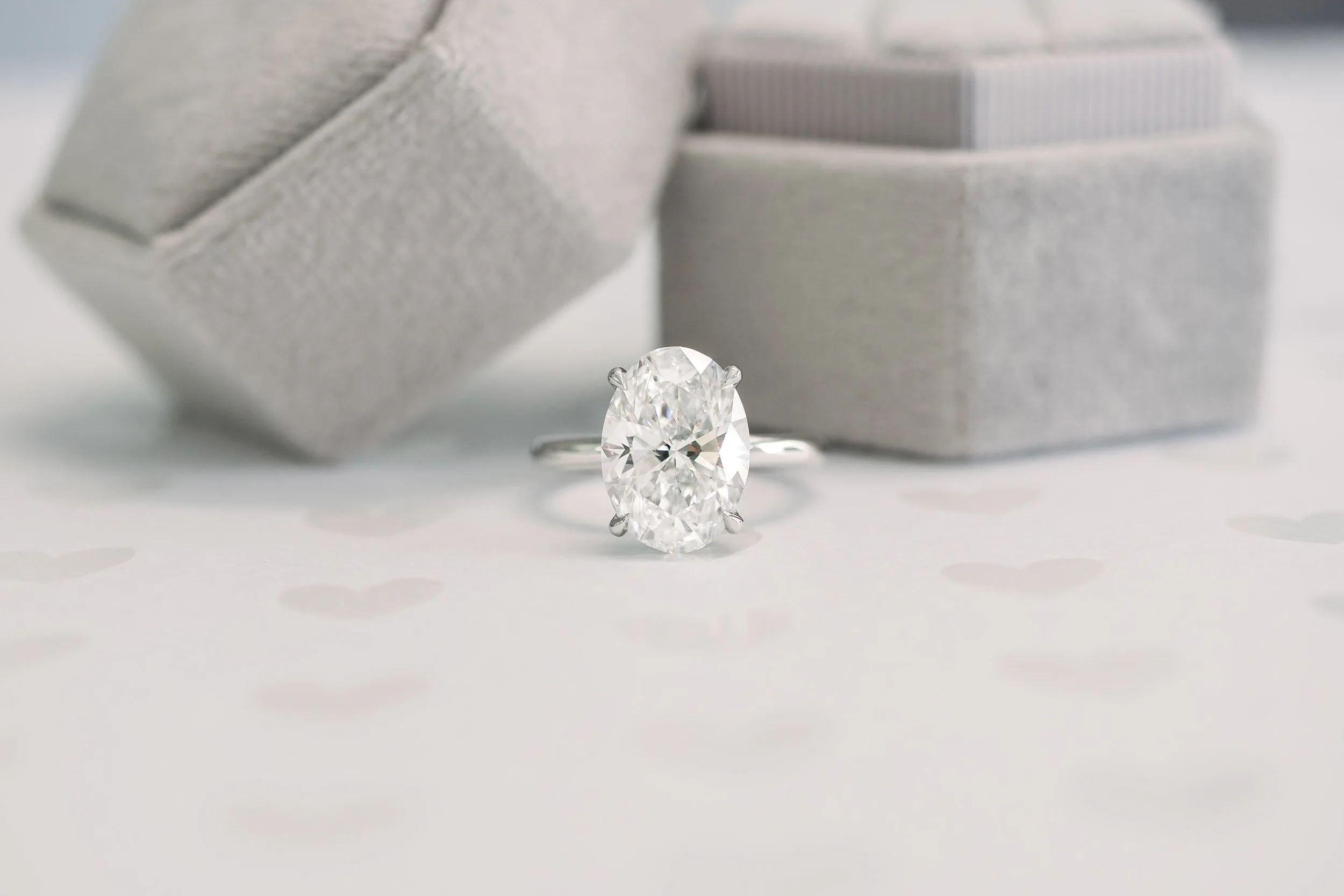 four carat oval in solitaire setting