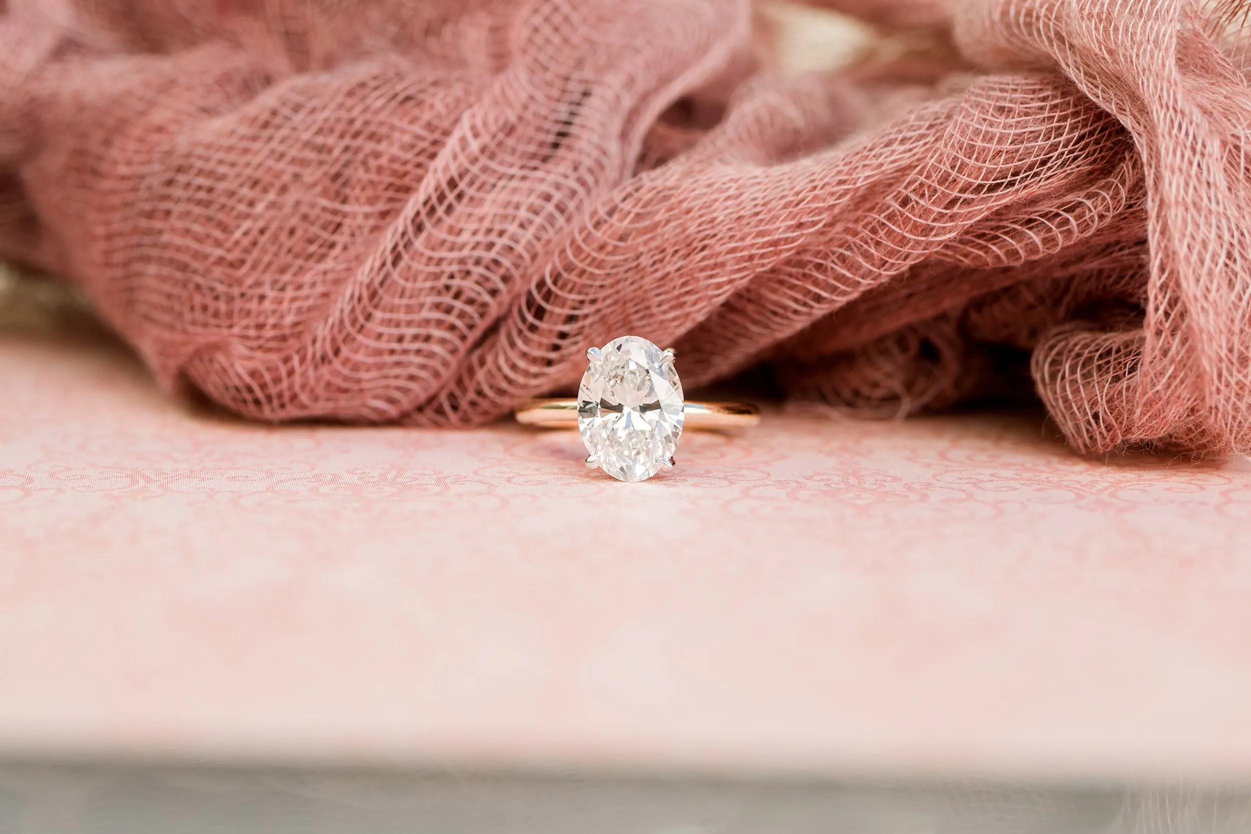 3ct oval in two-tone solitaire