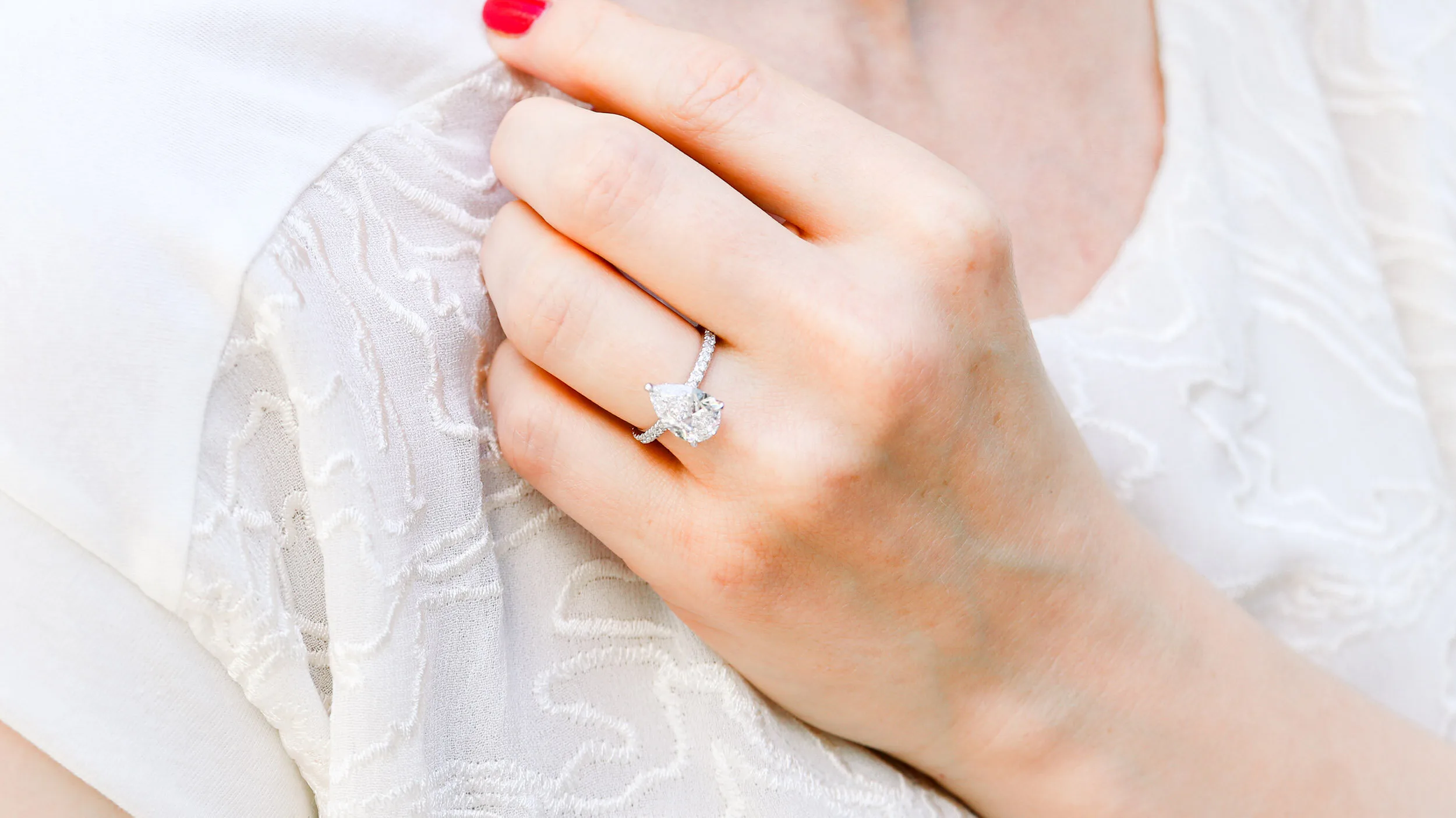 1.75 Carat Pear Lab Diamond Engagement Ring with Diamond Band and Diamond Gallery Ada Diamonds Design AD-211 on Model