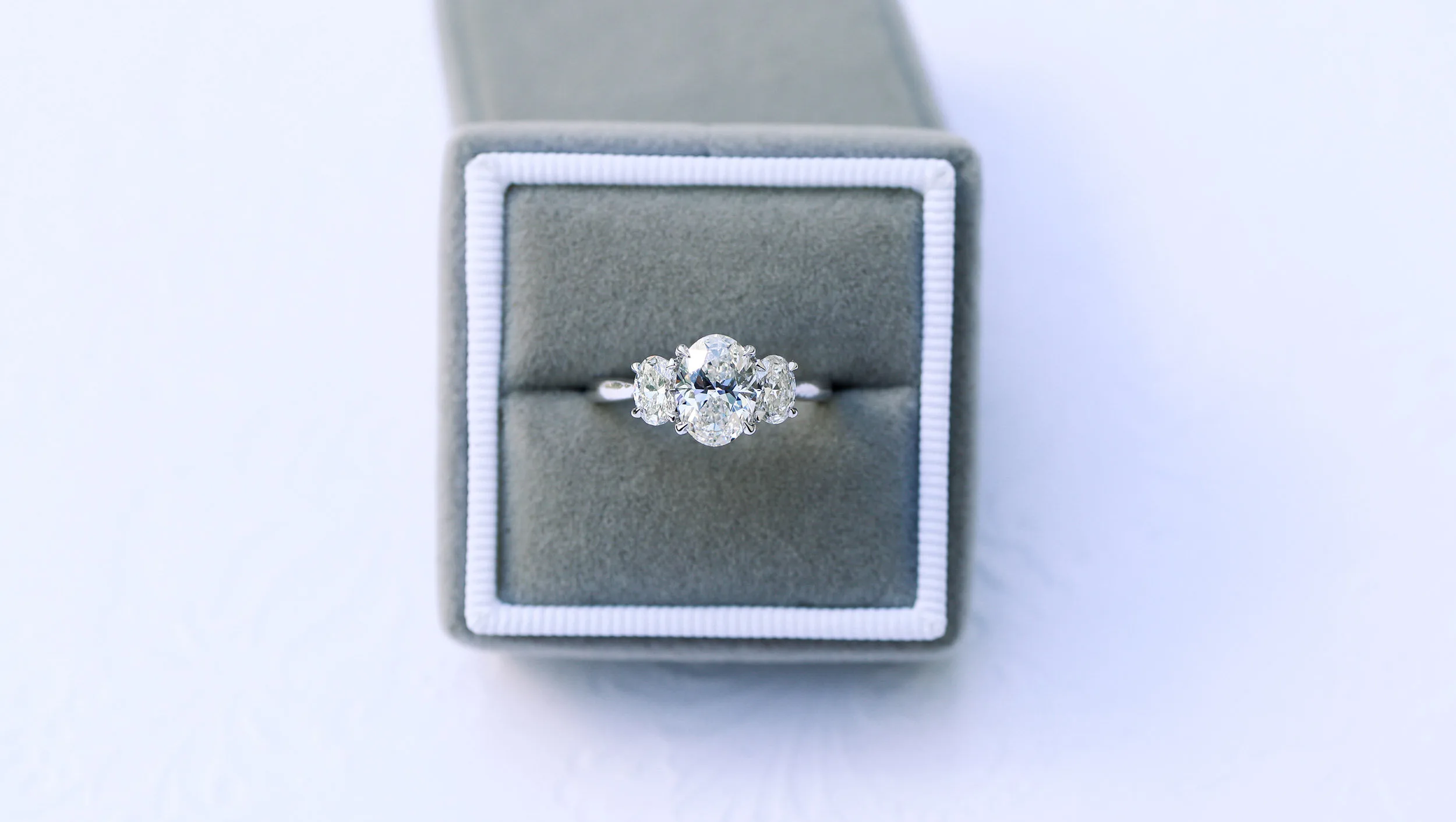 oval three stone lab diamond engagement ring