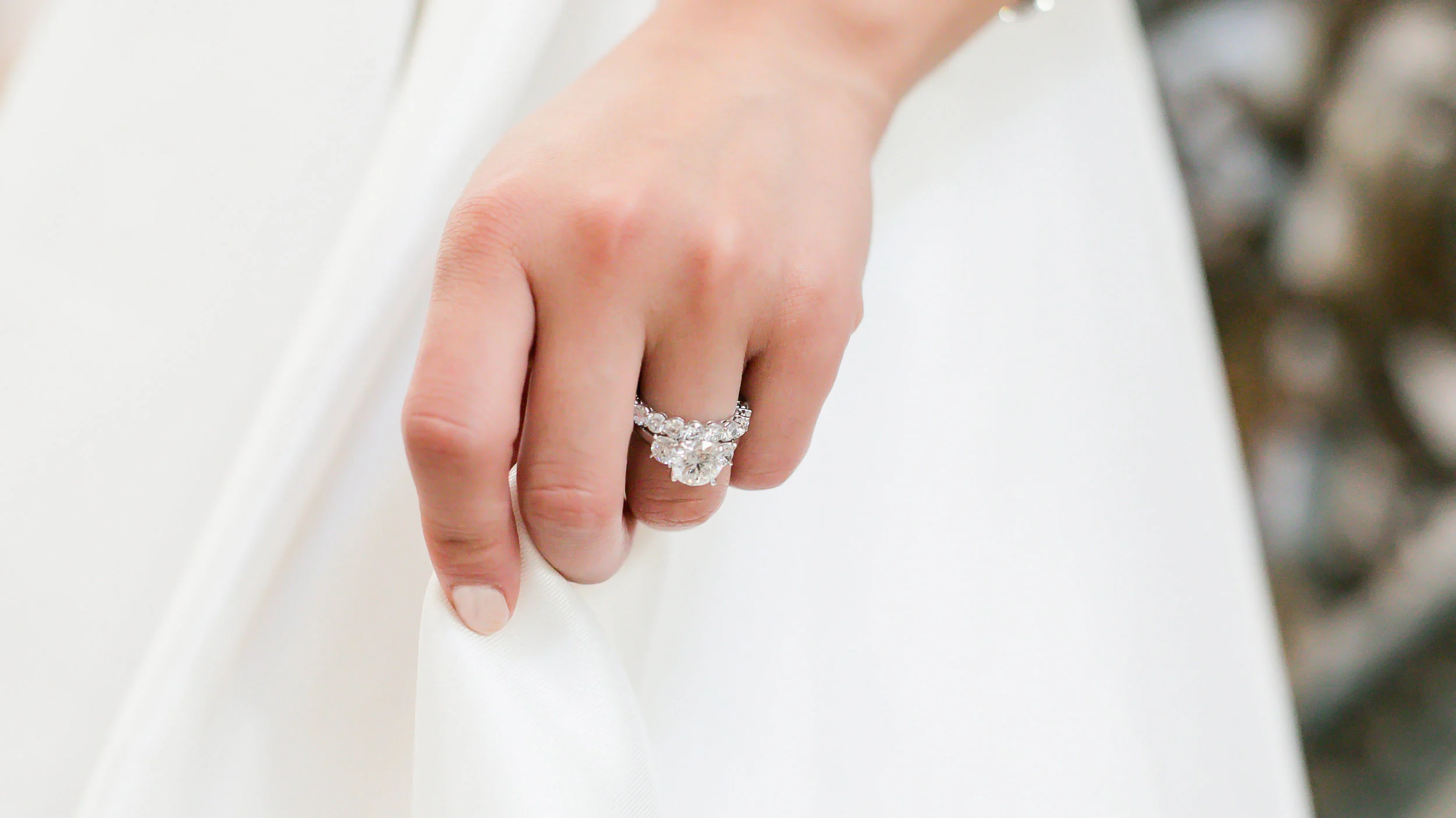 lab diamond three stone round engagement ring and prong set eternity band