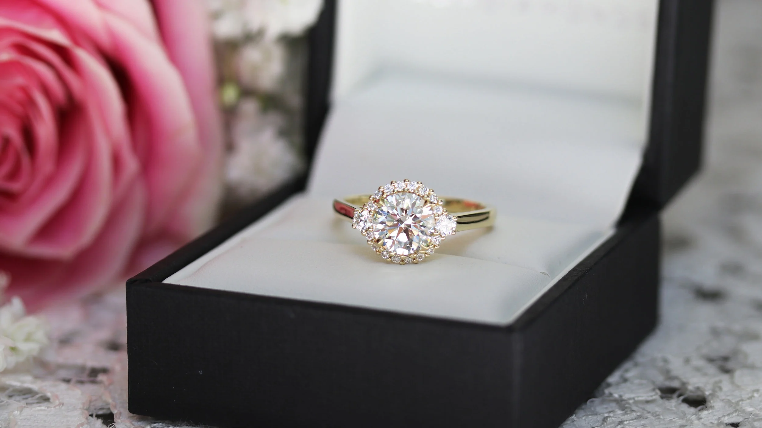 manmade diamond halo engagement ring yellow gold