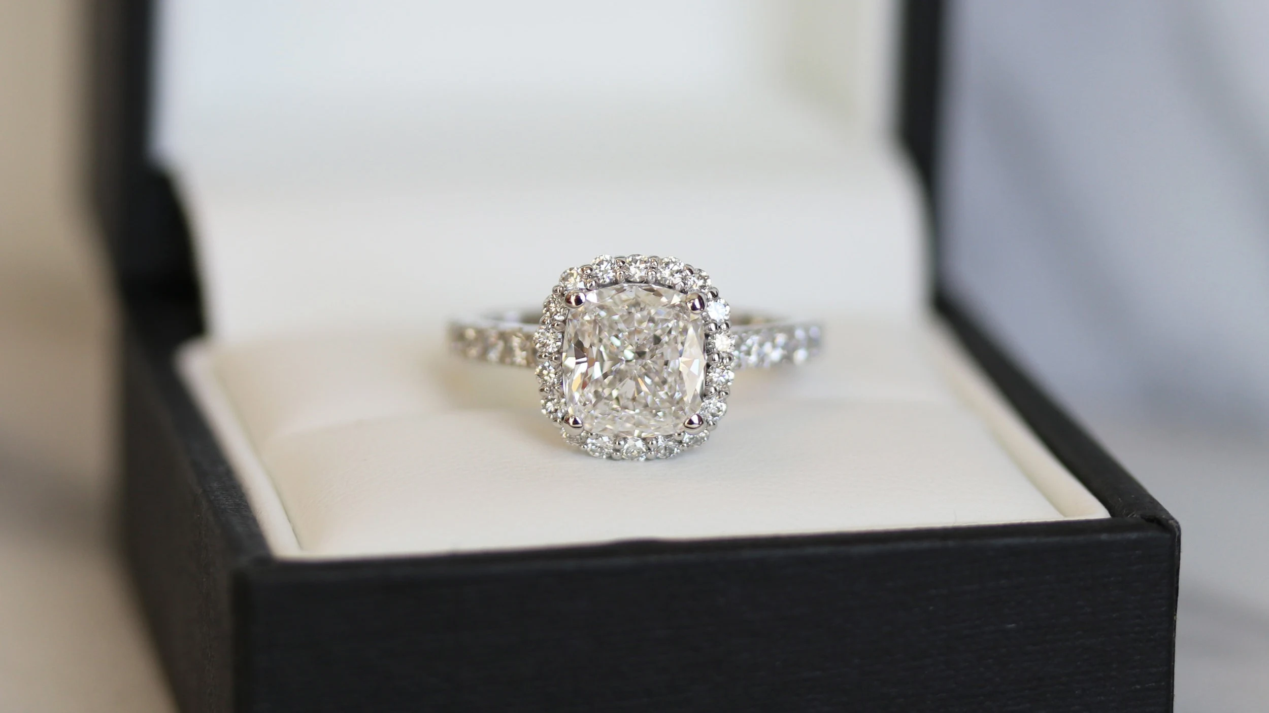 two carat cushion cut lab created diamond halo engagement ring