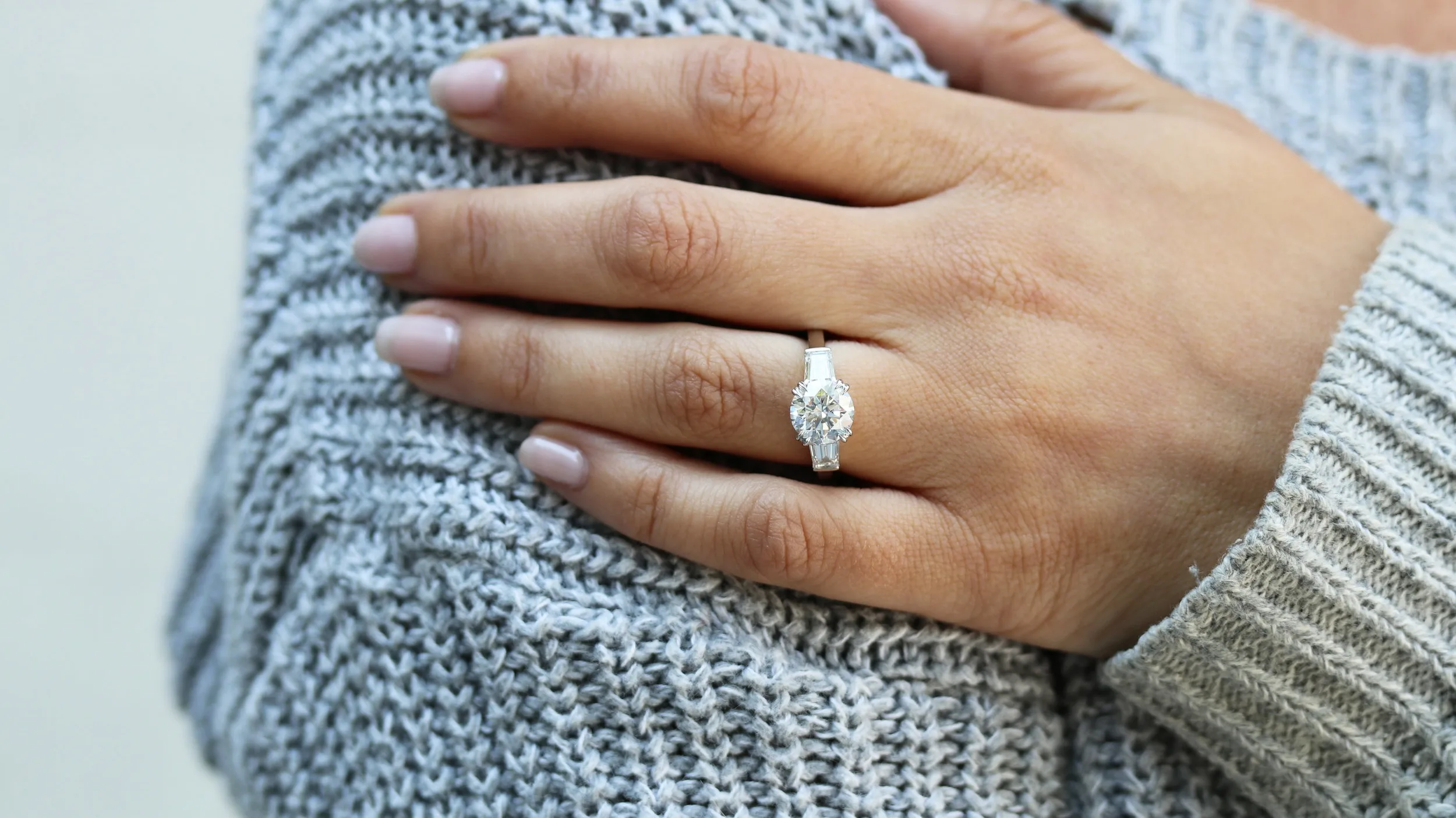 three stone round and baguette lab created diamond engagement ring