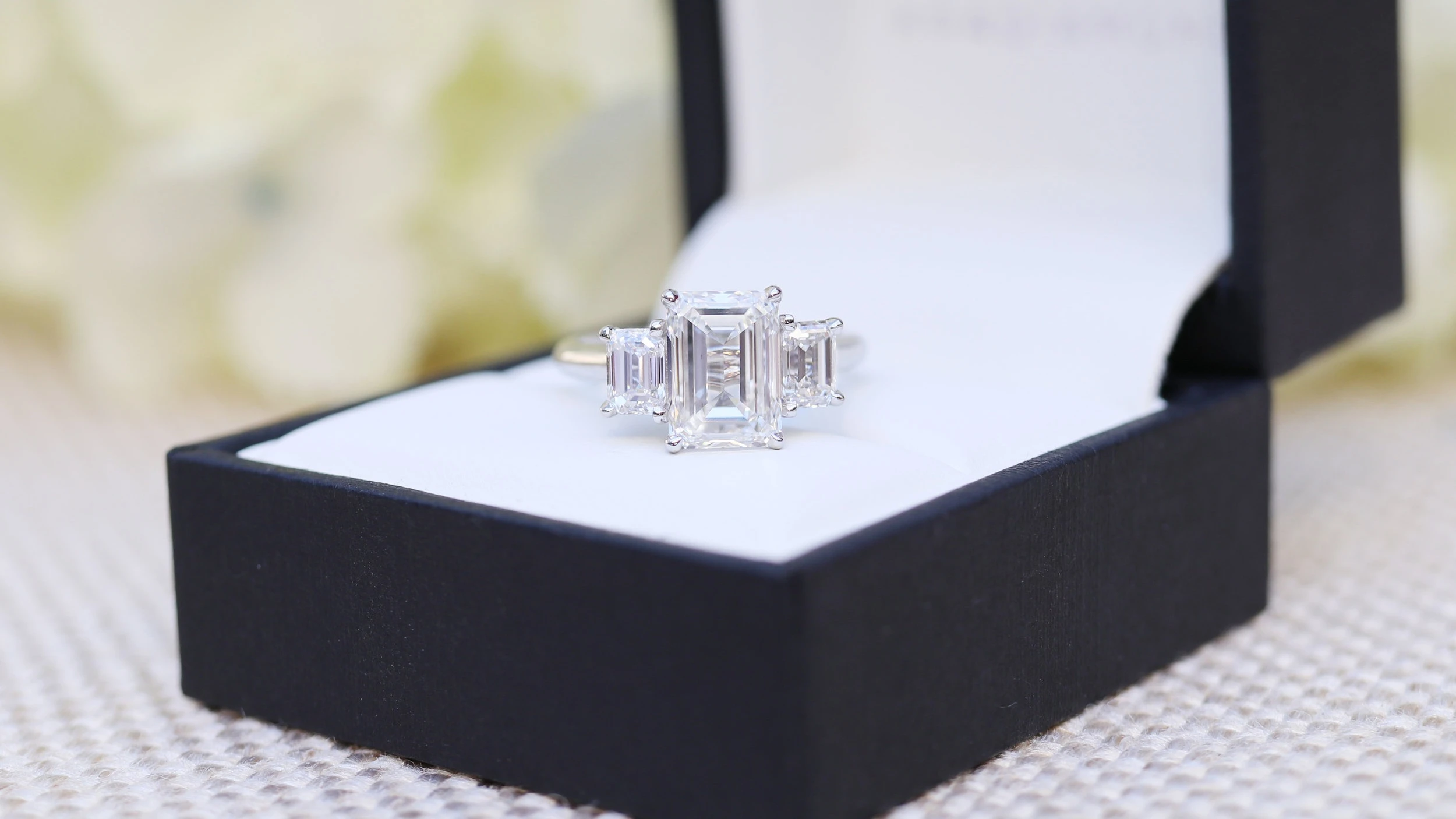 emerald cut three stone lab diamond engagement ring ad-114