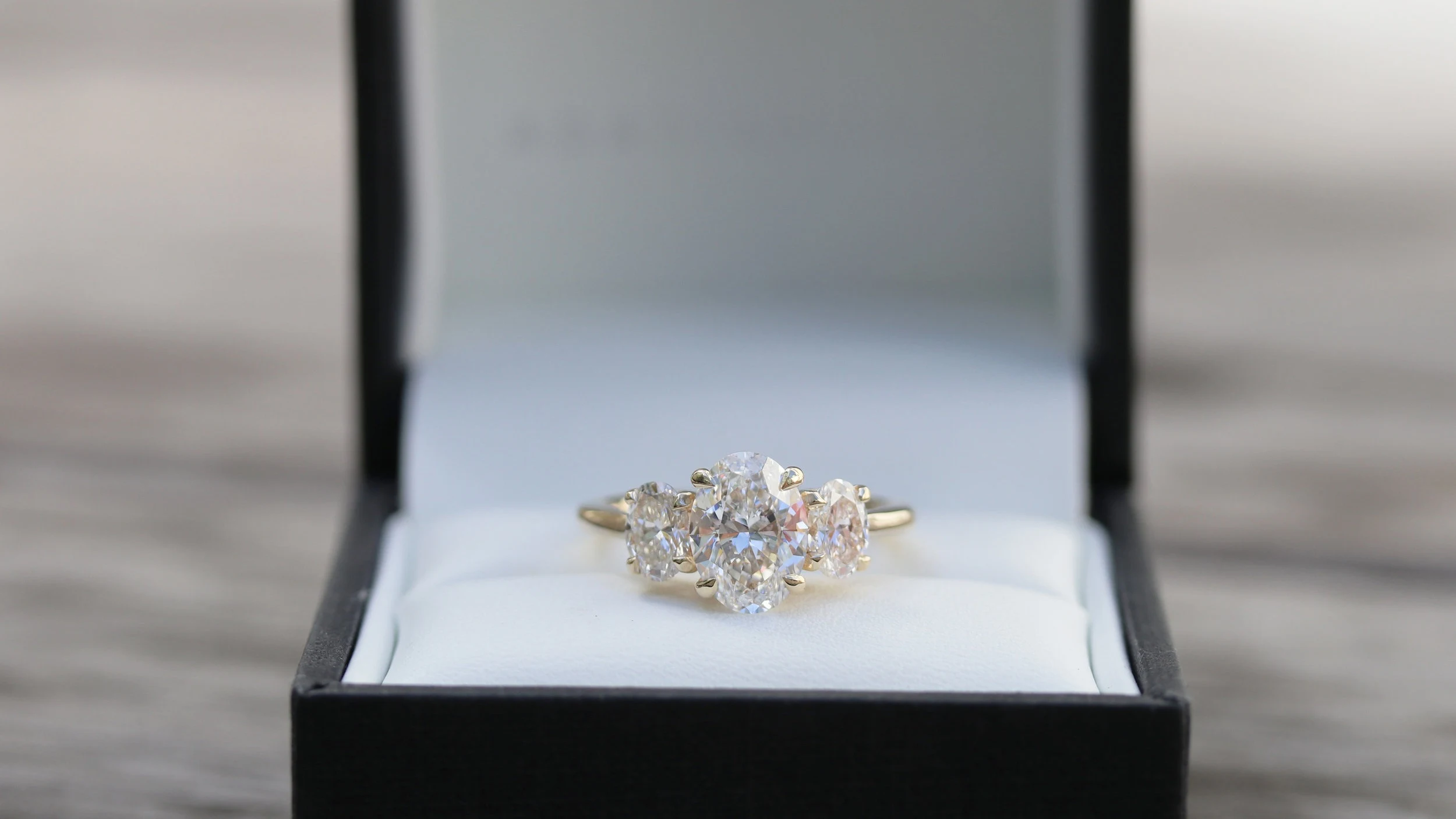 oval three stone lab diamond engagement ring