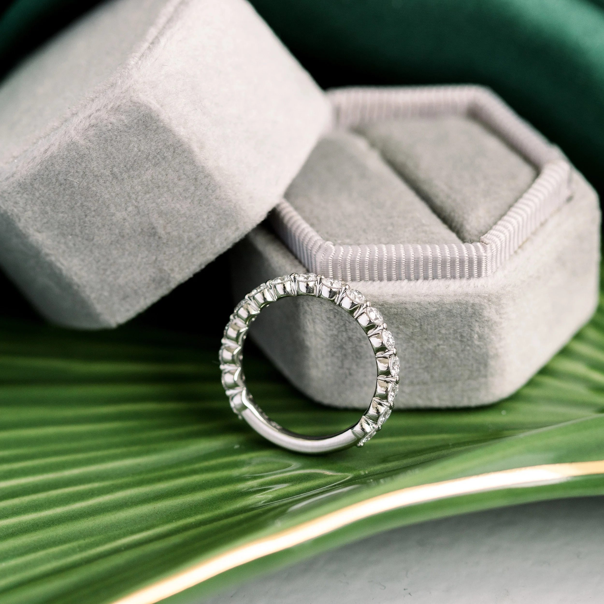 profile view of platinum shared prong lab diamond wedding band ada diamonds design ad 261