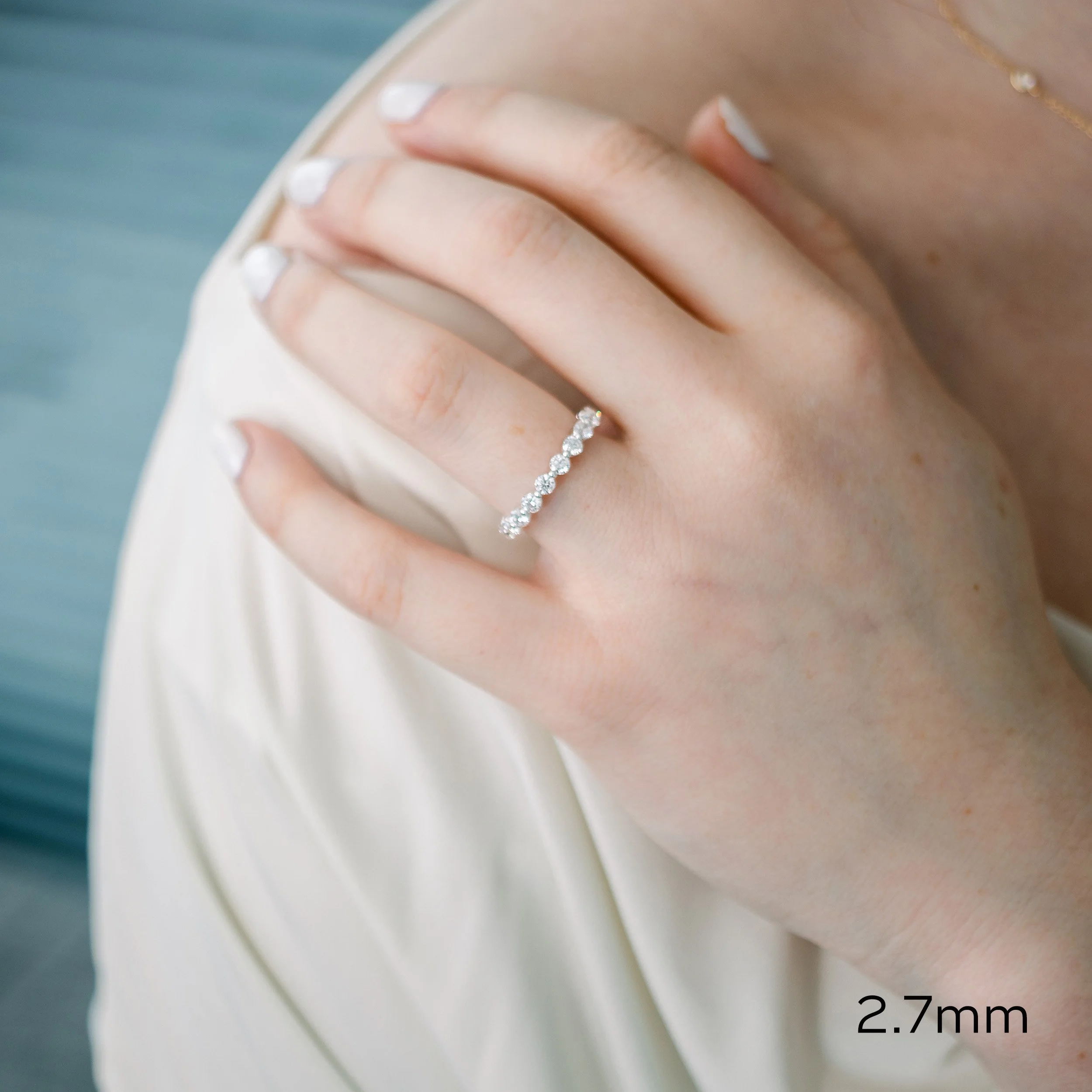 white gold lab diamond shared prong three quarter eternity band ada diamonds design ad 261 on model