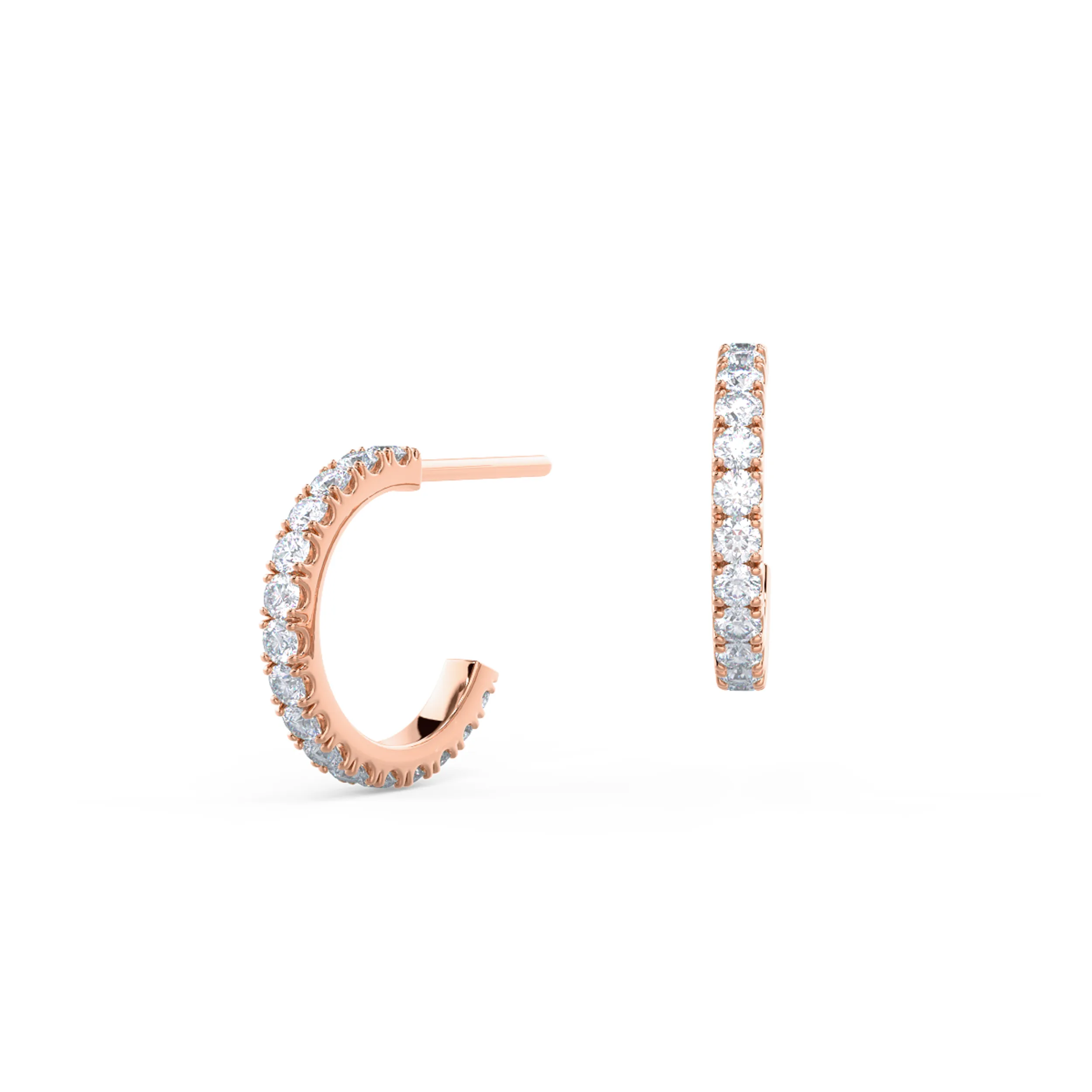 A classic pair of J-shaped huggie hoops featuring pave set lab created diamonds with a tension back in 14k Rose Gold.