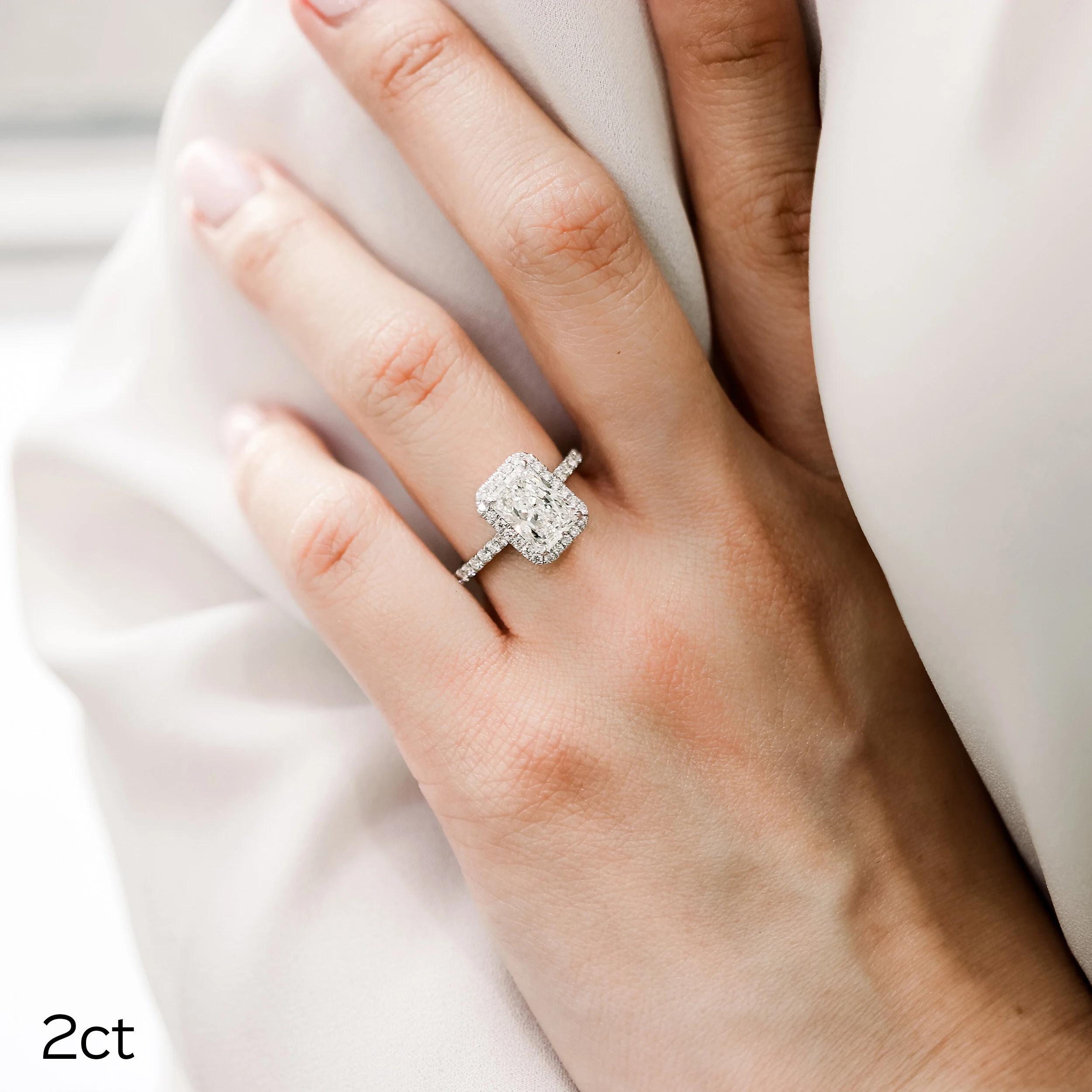3 Carat Radiant Cut Lab Grown Diamond Ring with Halo and Diamond Band Ada Diamonds Design AD-445 on Model