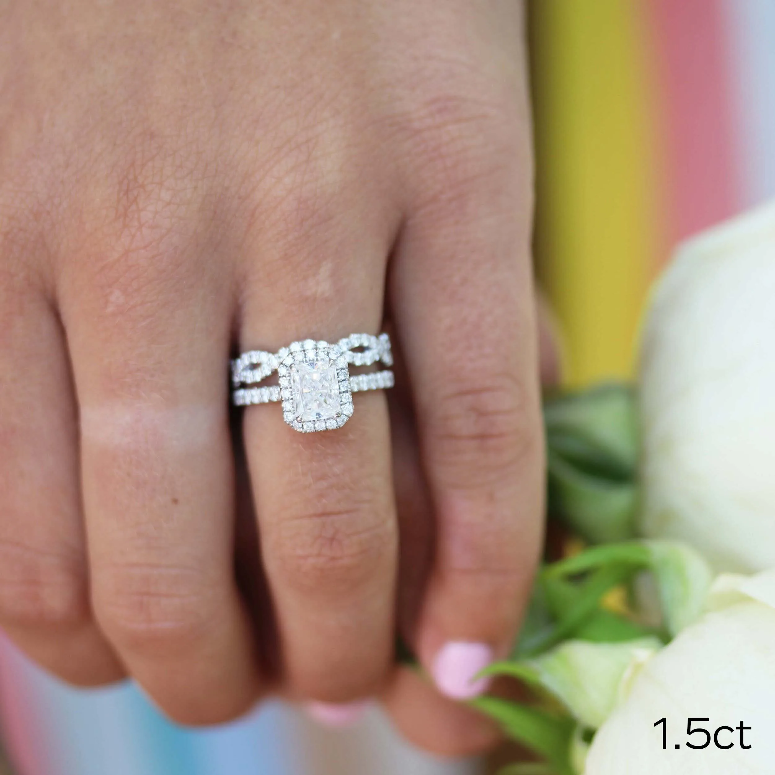 White Gold Lab Diamond Wedding Set with Radiant Cut Halo Engagement Ring and Twisting Wedding Band Ada Diamonds Design AD-445 on Hand