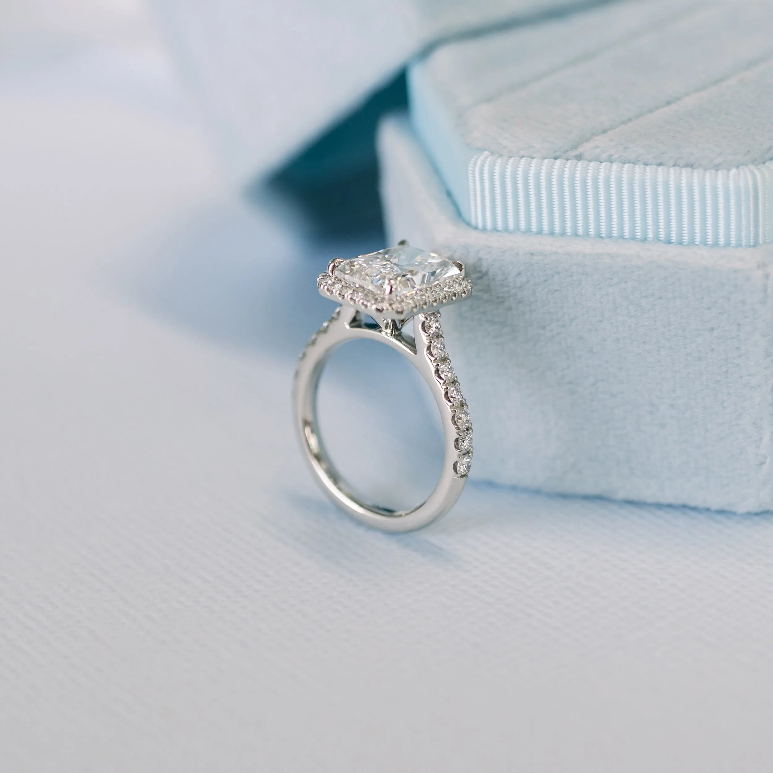 Platinum Radiant Halo Pavé Diamond Engagement Ring featuring 2.5 ctw Lab Diamonds (Profile View)
