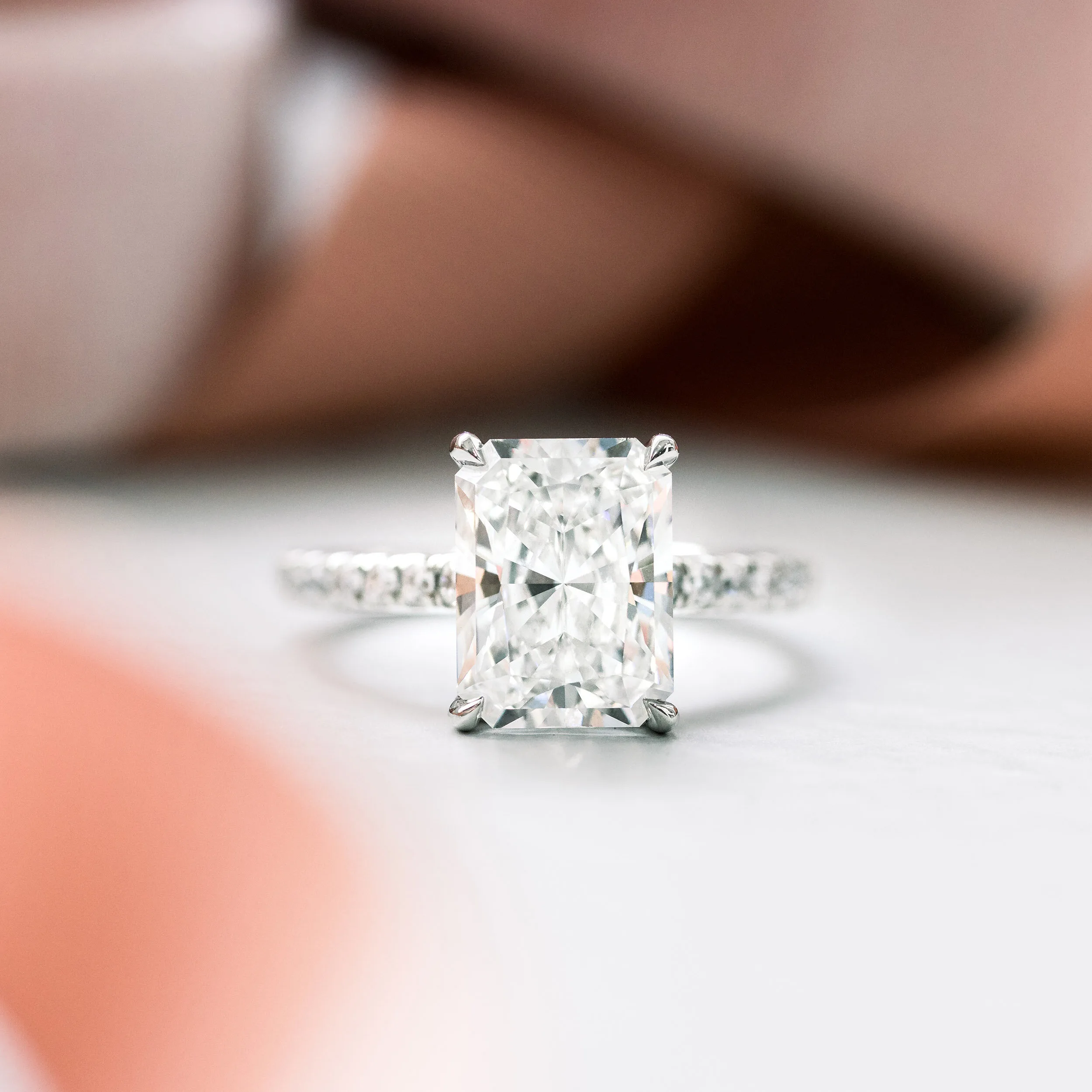radiant cut lab diamond in cathedral pave setting