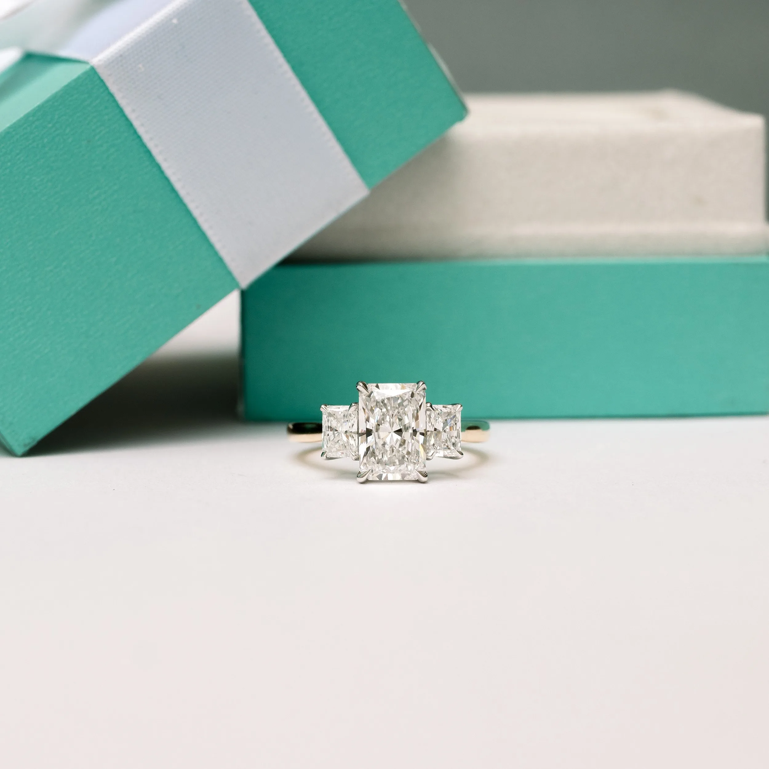 platinum and 18k yellow gold 2.5 ct radiant cut three stone lab diamond engagement ring ada diamonds design ad 484 macro