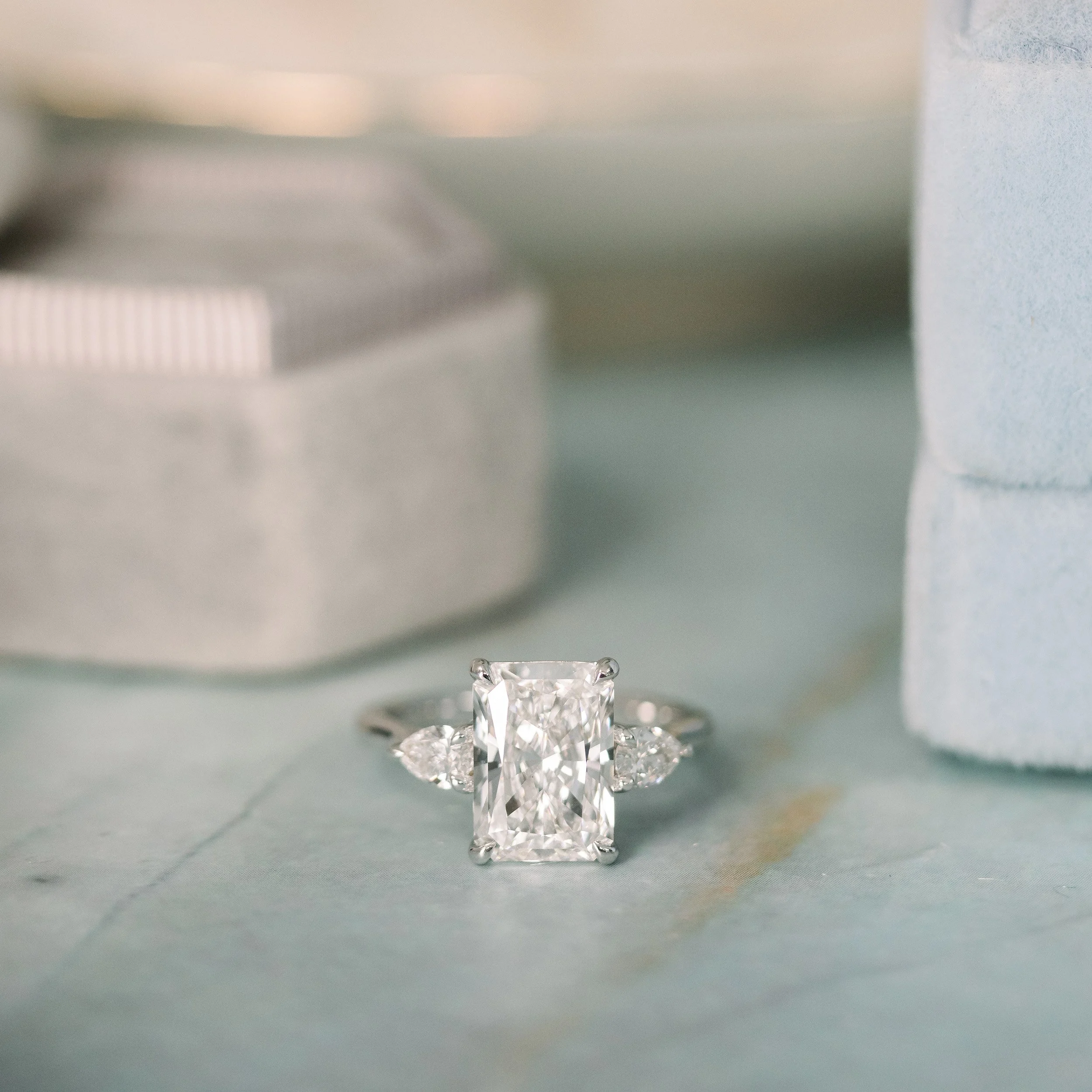 18k 2.5 ct white gold radiant cut and pear three stone man made diamond engagement ring ada diamonds design ad 486 macro