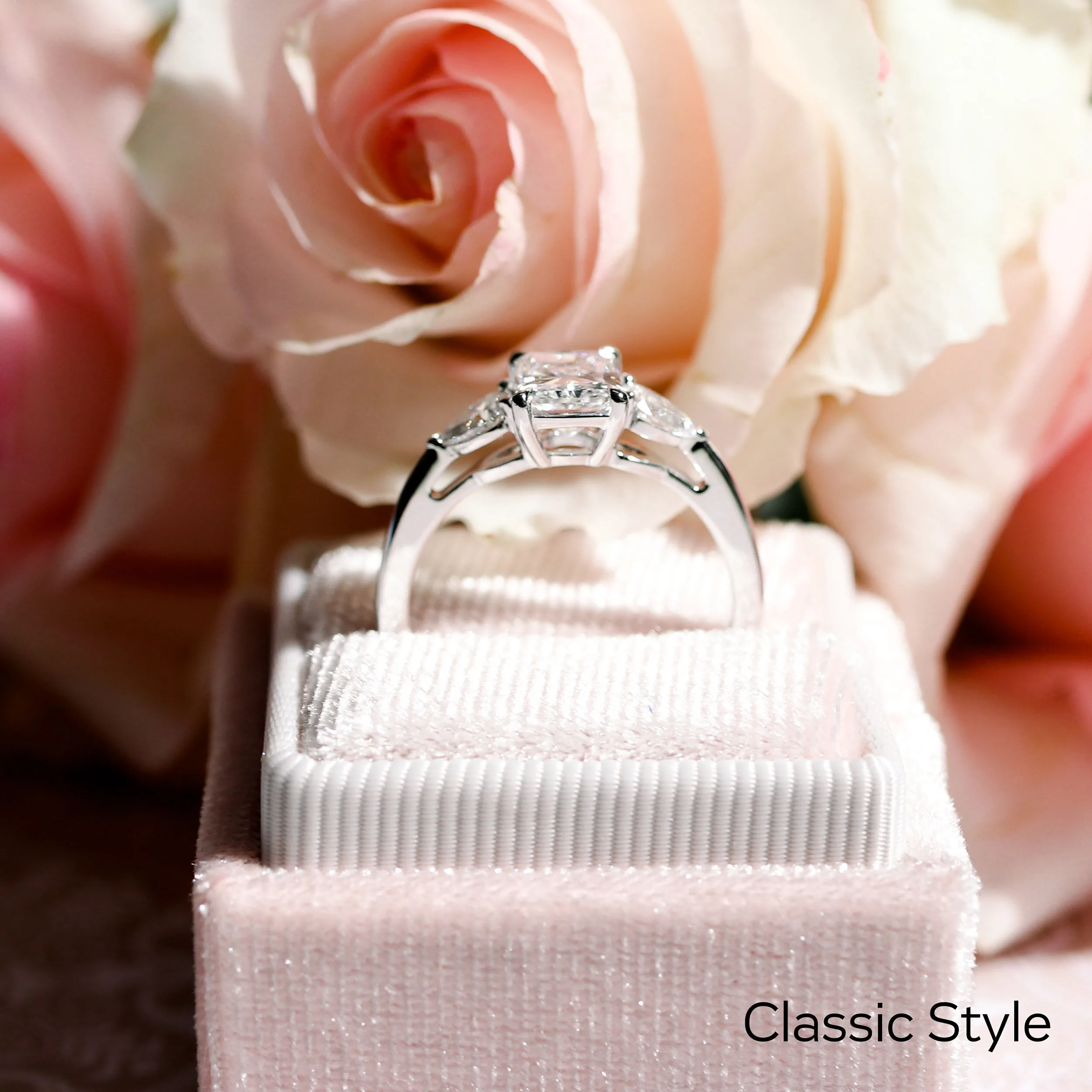 hand-selected radiant lab diamond and pear side stones in a classic 14k white gold ring setting