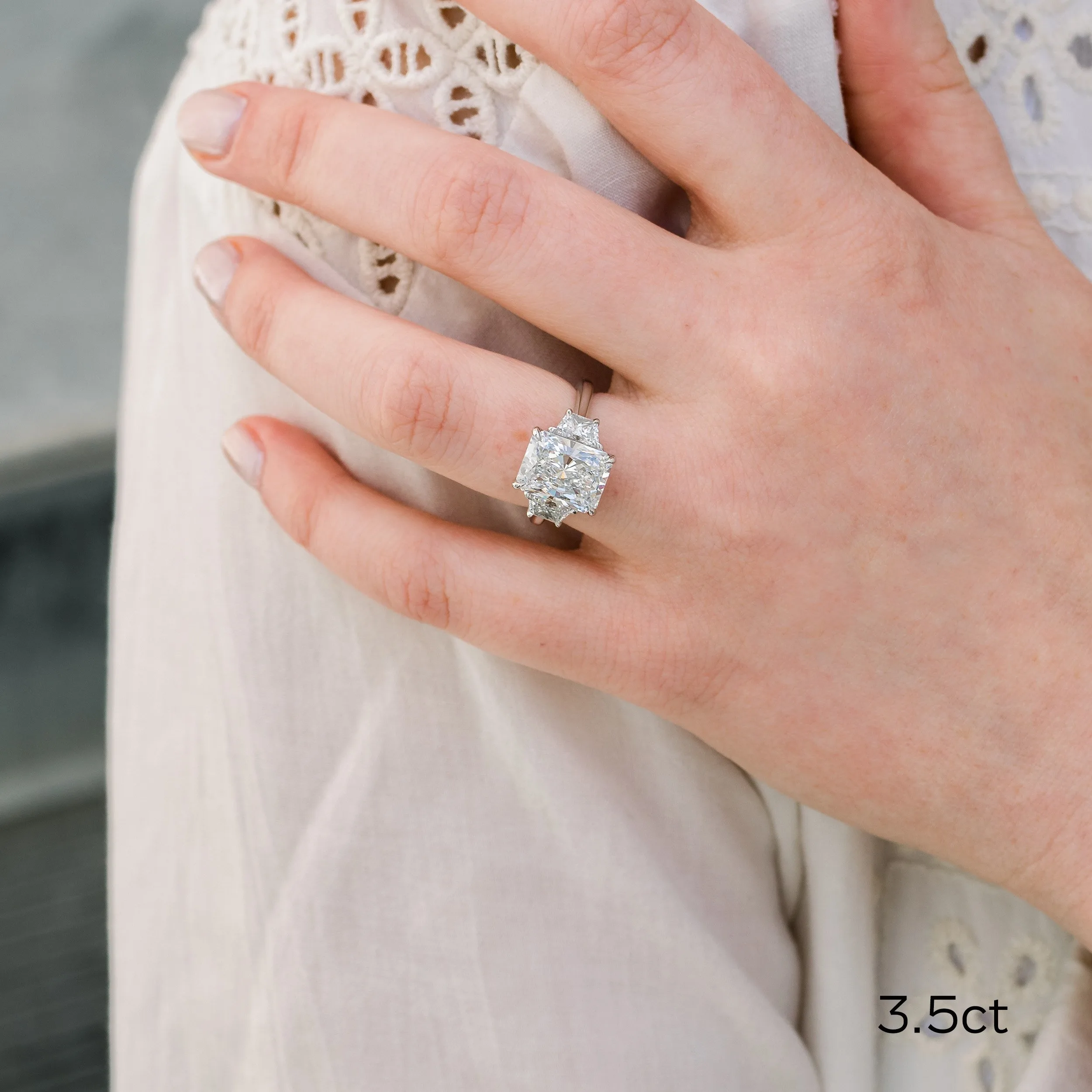 platinum 3.5ct radiant cut lab diamond engagement ring with trapezoid side stones ada diamonds design ad 278 on model