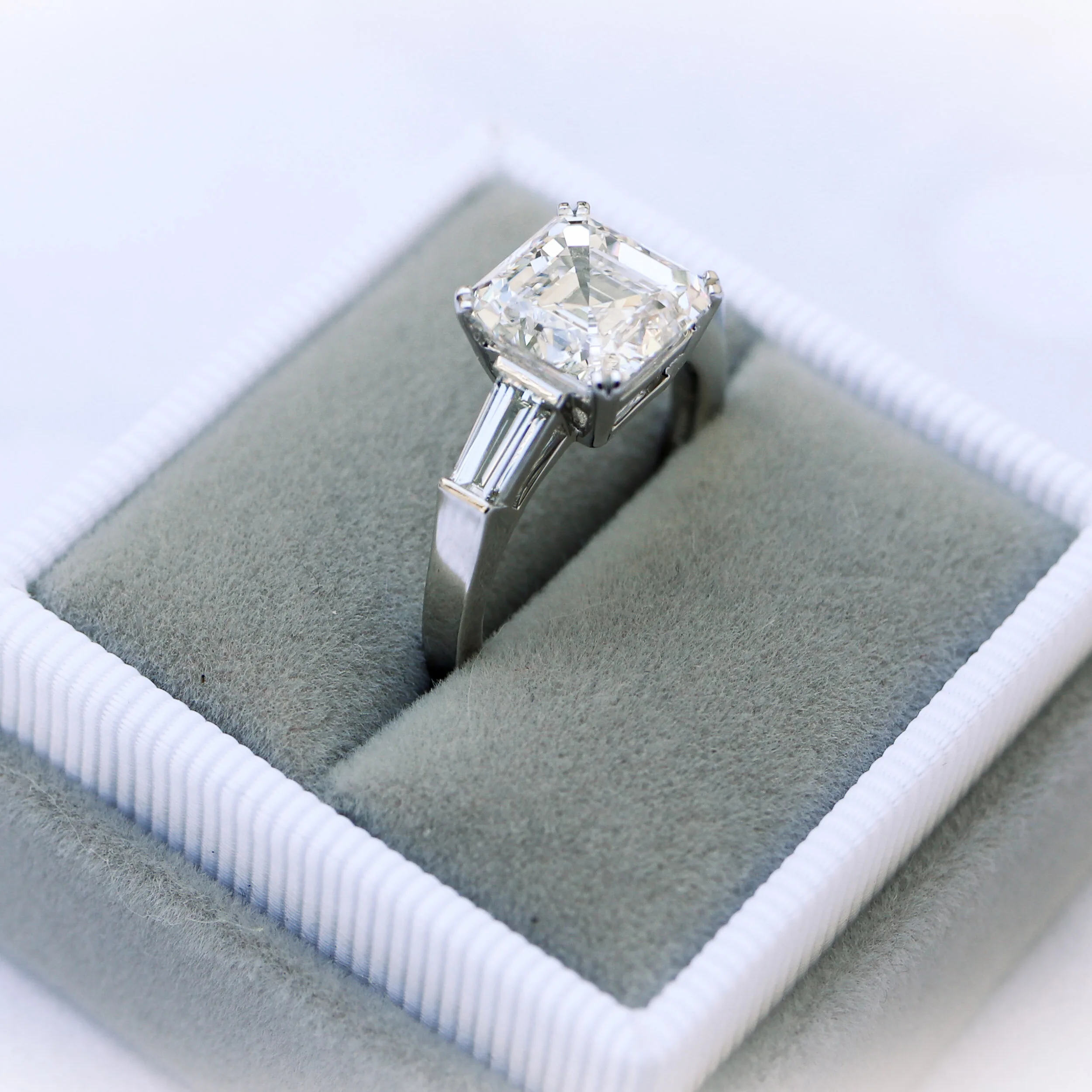 platinum double claw prong asscher ring with tapered baguettes featuring lab grown diamonds