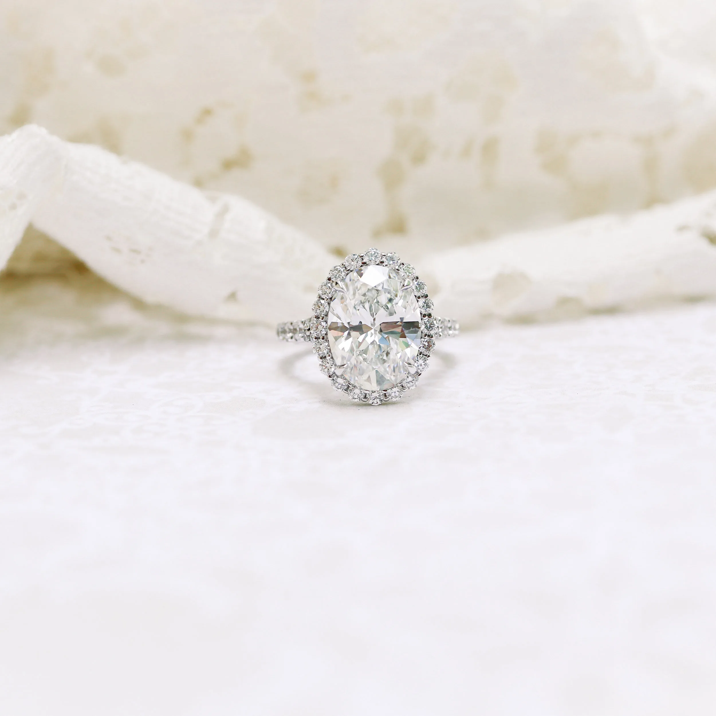 Platinum 5 Carat Oval Halo Split Shank Engagement Ring Featuring Lab Grown Diamonds Ada Diamonds Design Number AD-161 Macro Shot