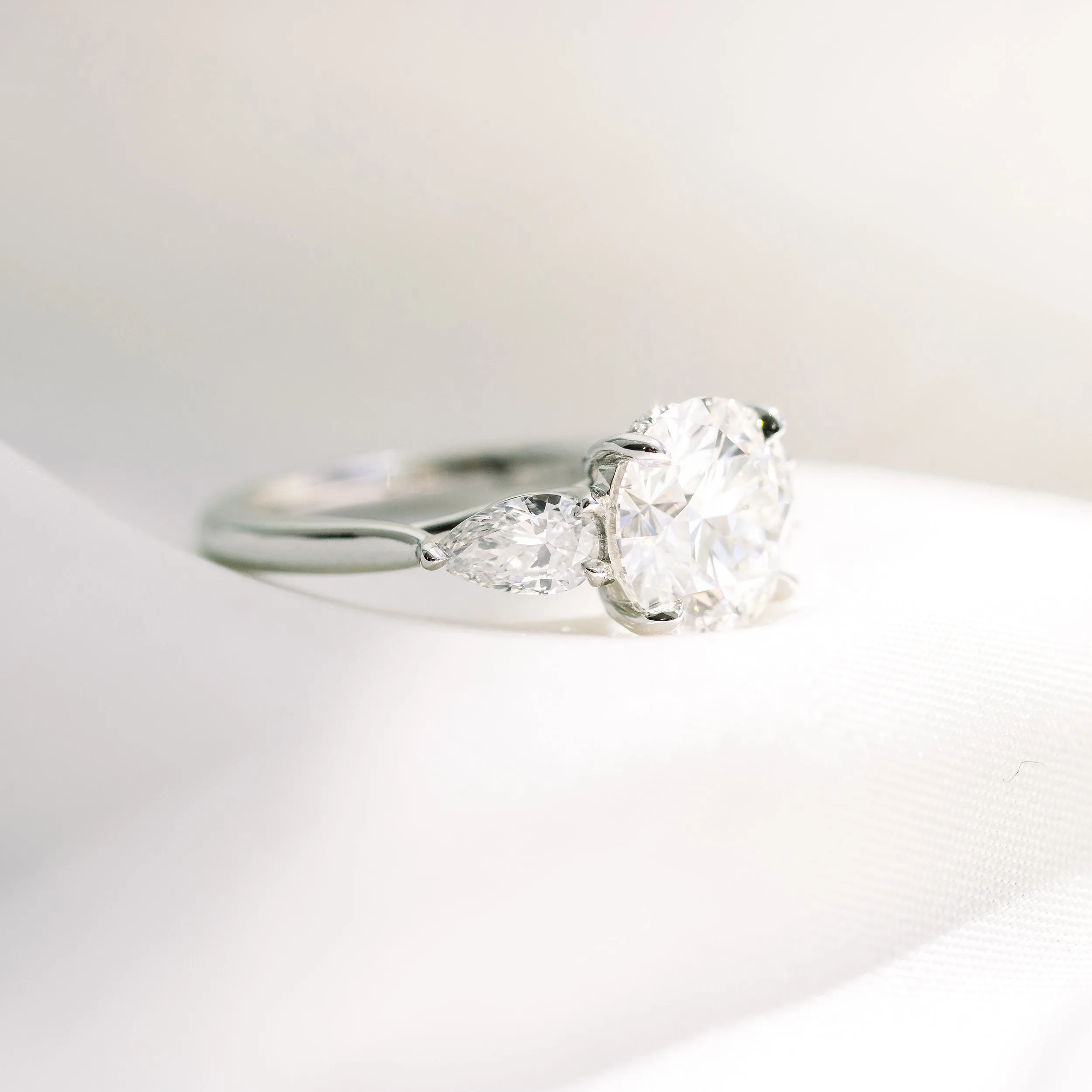 platinum 2.5ct round and pear three stone lab diamond engagement ring ada diamonds design ad 456 profile