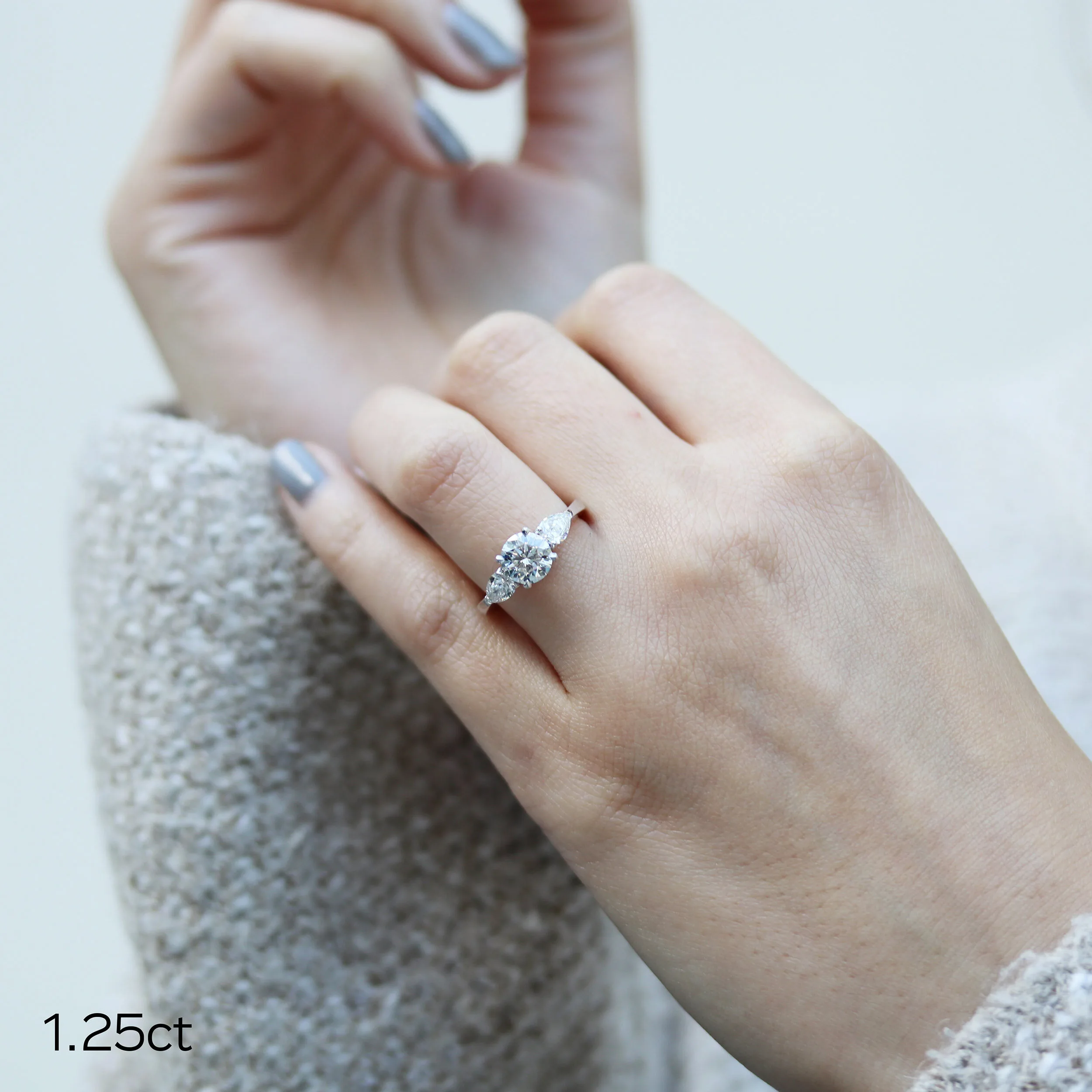 platinum round 1.25ct lab diamond ring with pear side stones ada diamonds design ad-456 on hand