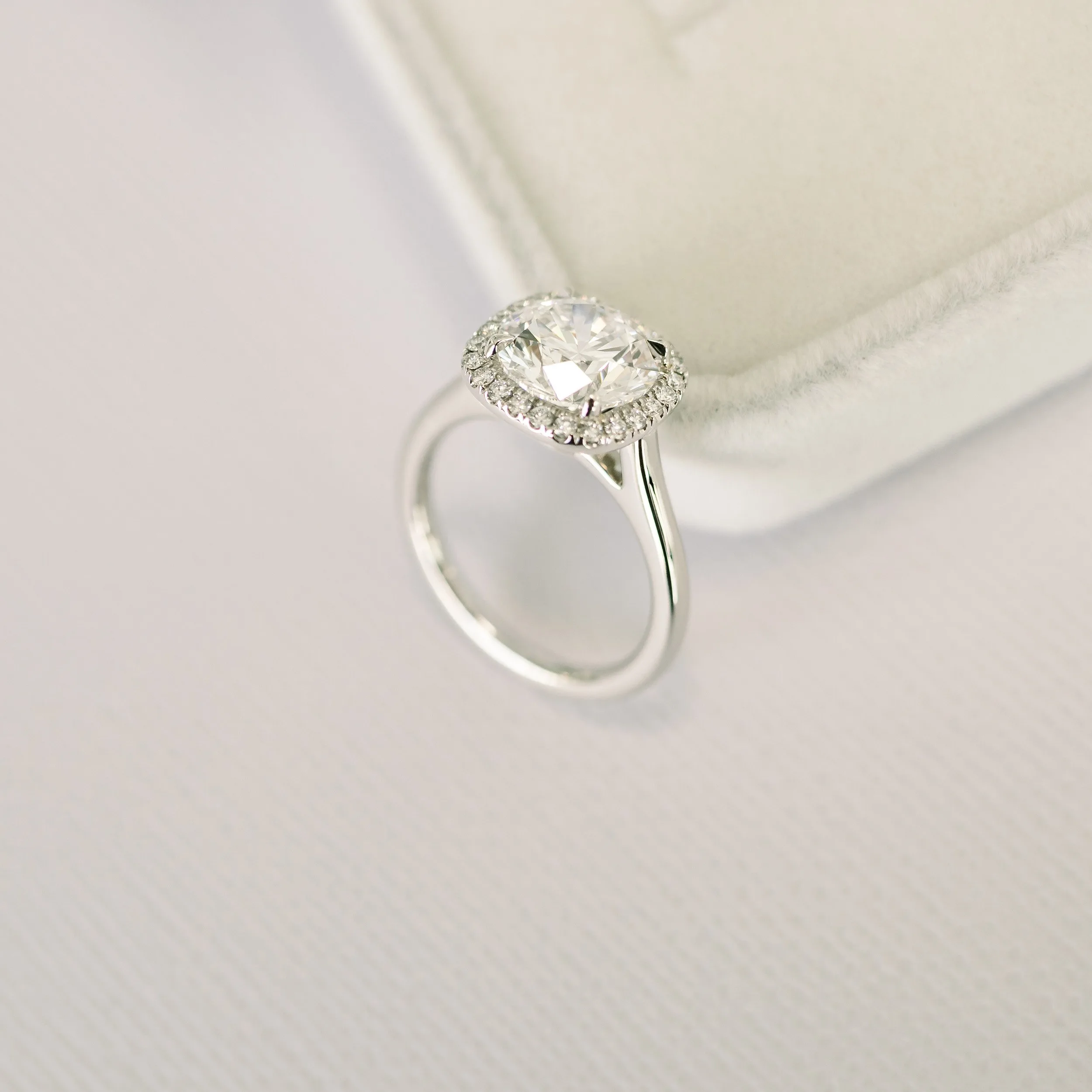 platinum 2.5 carat round lab created diamond engagement ring with halo ada diamonds design ad 073 profile view