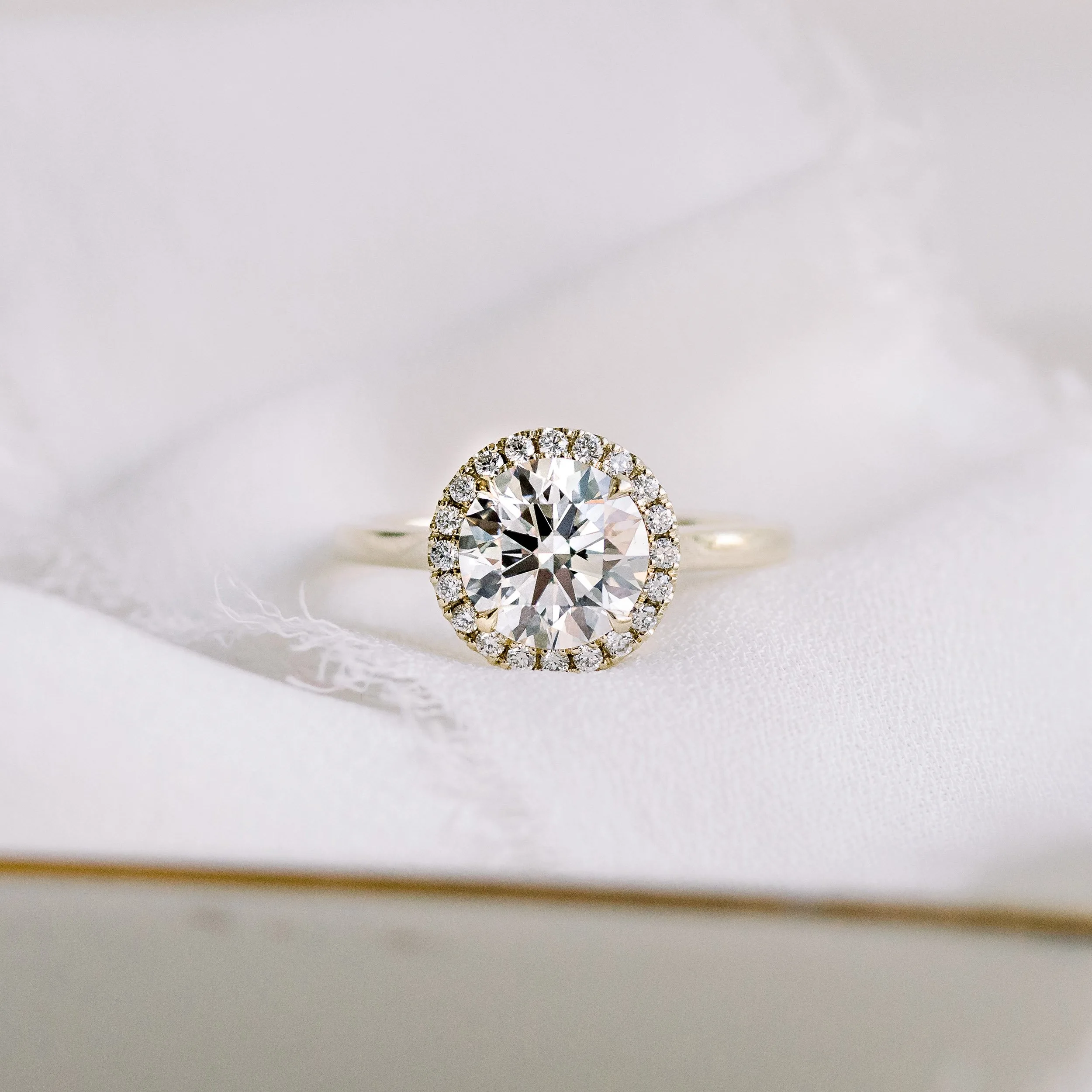 yellow gold round single halo engagement ring with manmade diamond ada diamonds design ad073