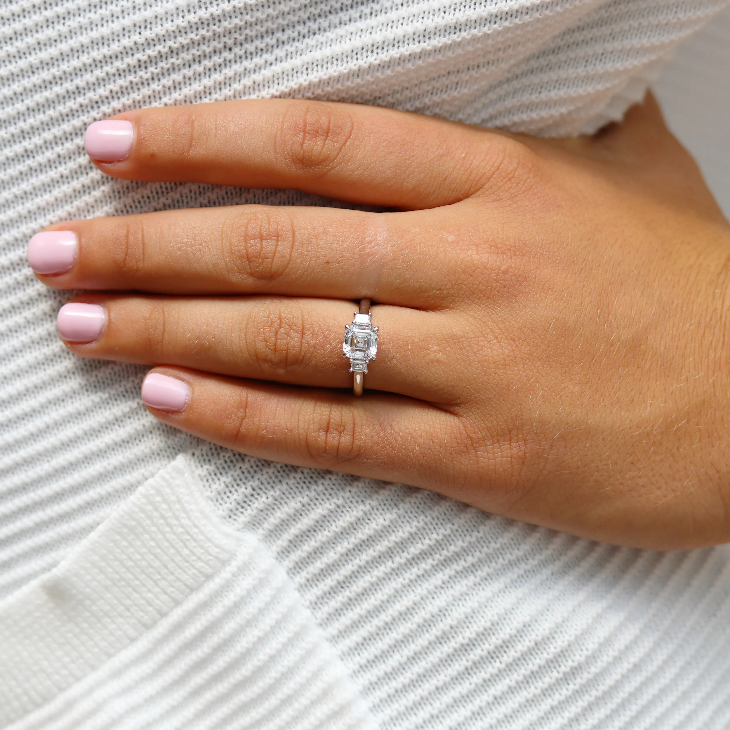 White Gold 2 Carat Asscher Lab Diamond Ring with Emerald Cut Side Stones Ada Diamonds Design AD-493 on hand