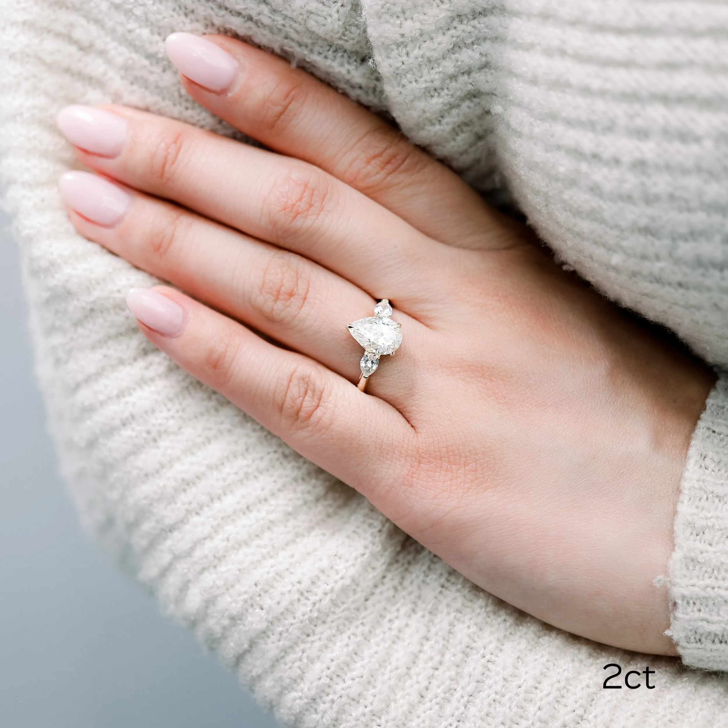 18k yellow gold 2 carat pear three stone lab diamond engagement ring ada diamonds design ad 218 on model
