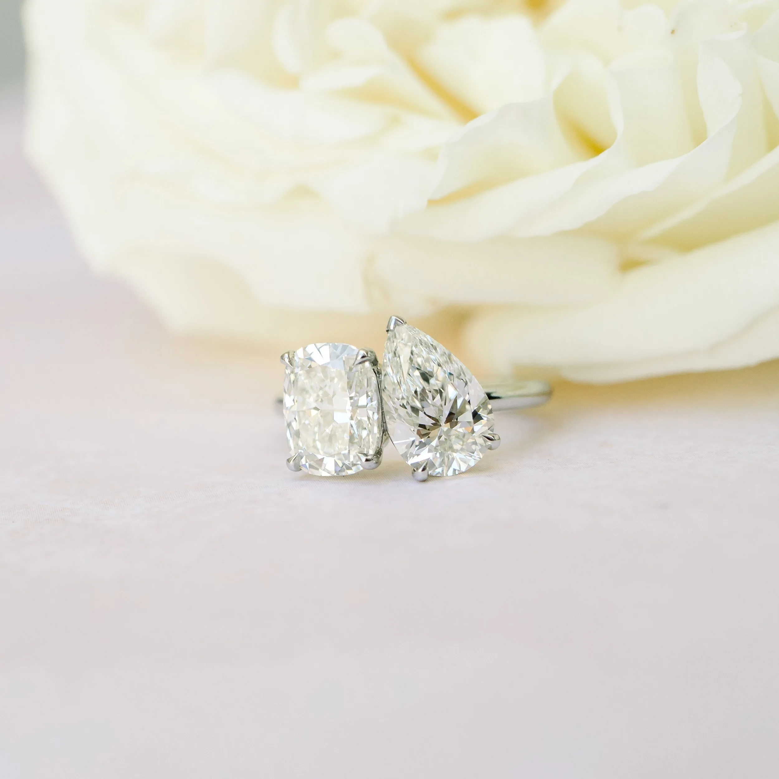 platinum 2 stone cushion and pear toi et moi engagement ring with man made diamonds ada diamonds design ad 363 macro