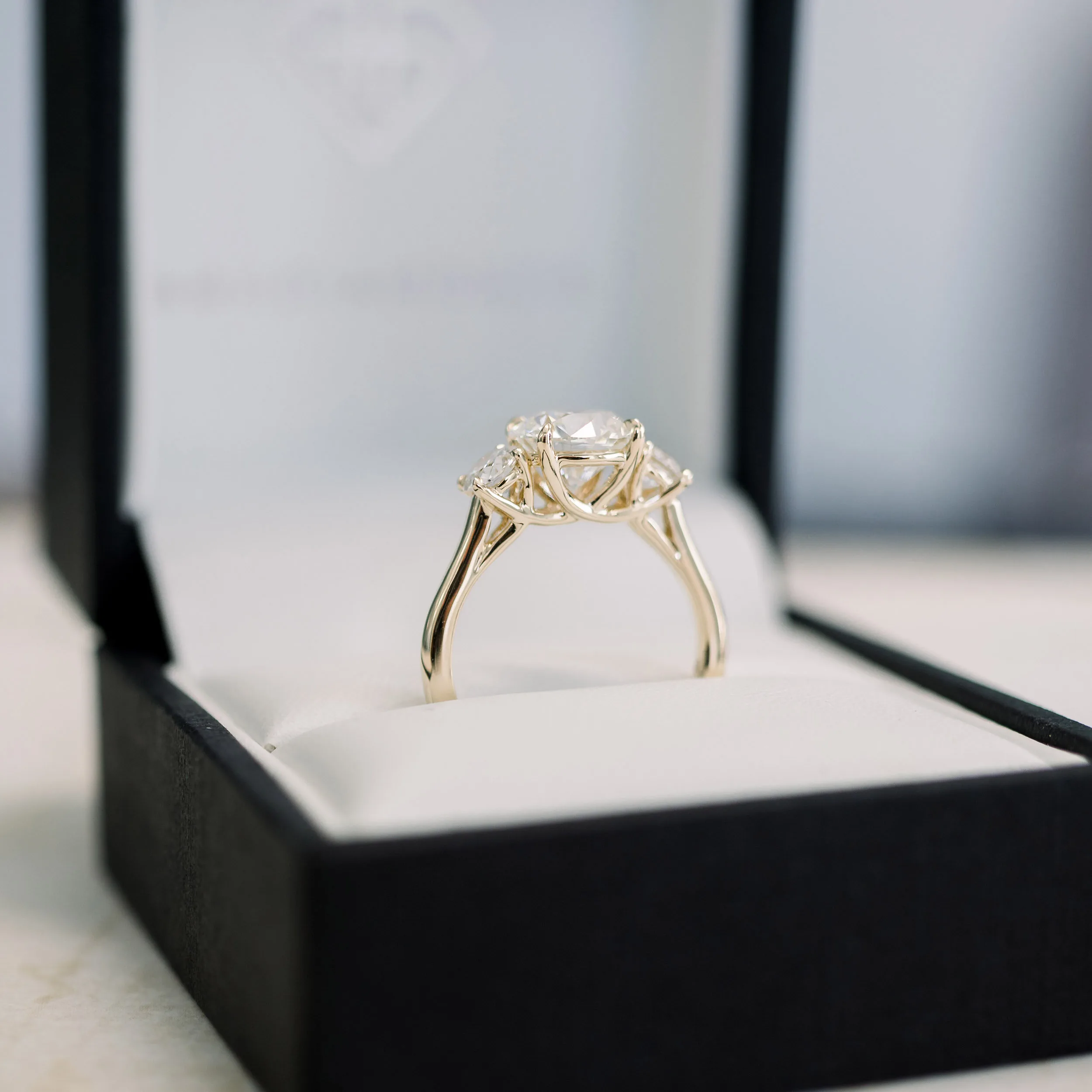 18 Karat Yellow Gold Trellis Round Three Stone Engagement Ring Ada Diamonds Design AD-070