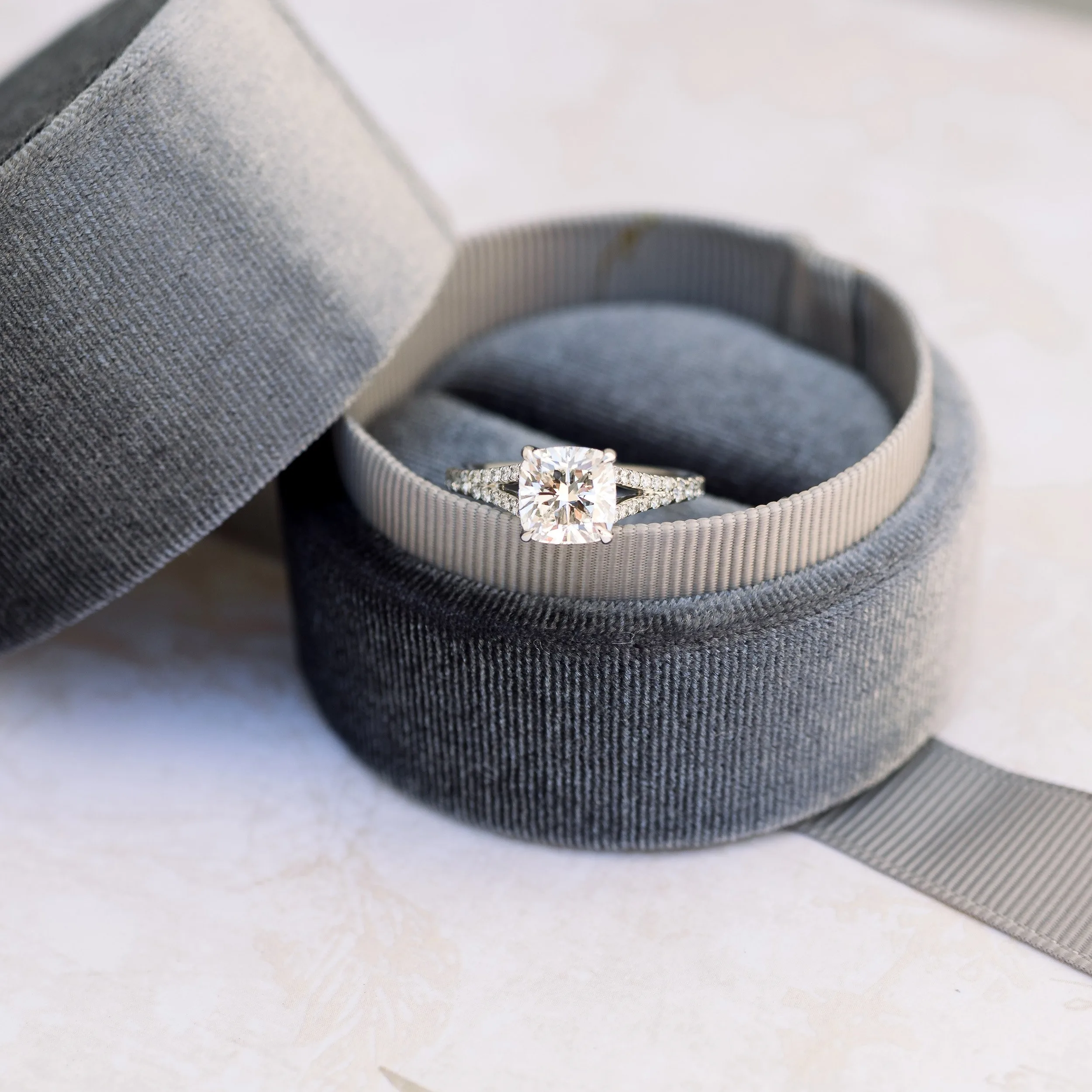 platinum two carat cushion cut lab grown diamond engagement ring with split shank pave band ada diamonds design ad 153