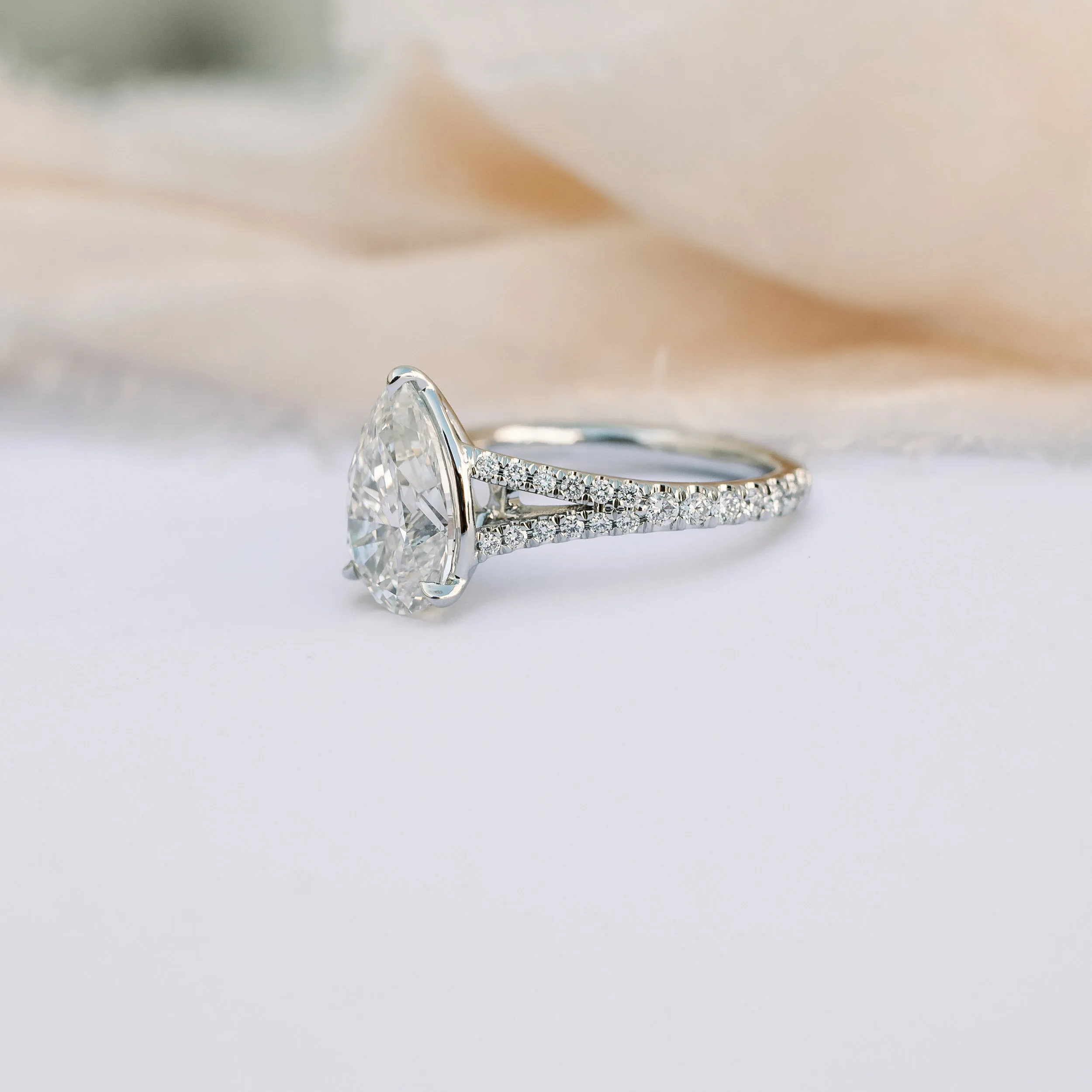 lab created pear diamond in white gold