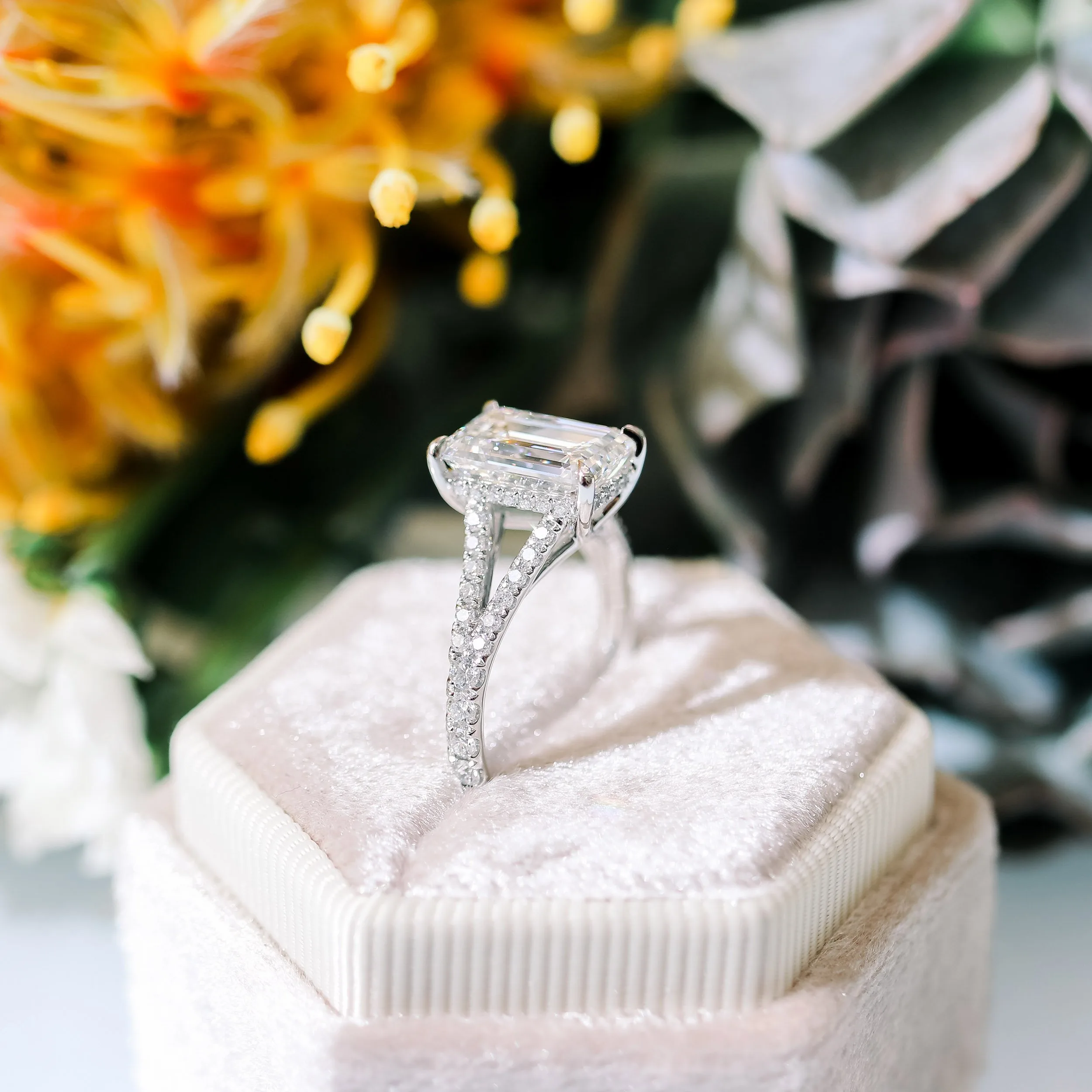 platinum pave engagement ring with emerald cut