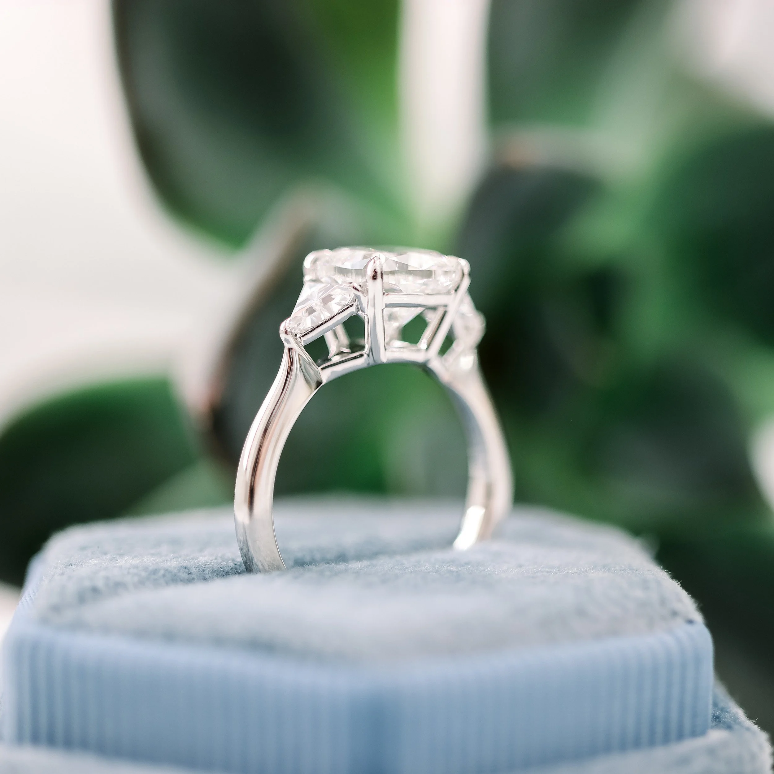 platinum three stone 2 ct cushion cut lab diamond engagement ring with trillion side stones ada diamonds design ad472 profile view