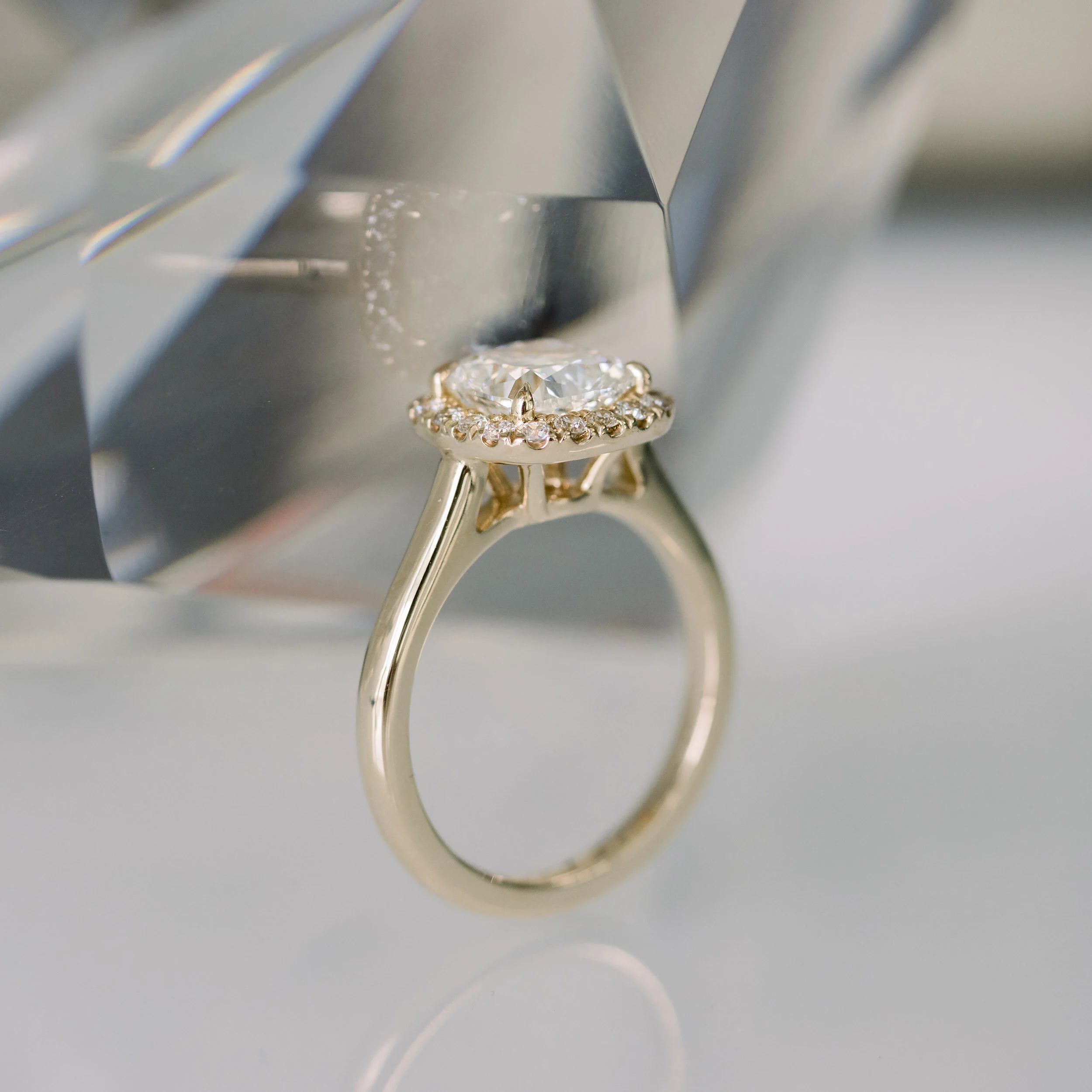 lab created diamond engagement ring yellow gold halo