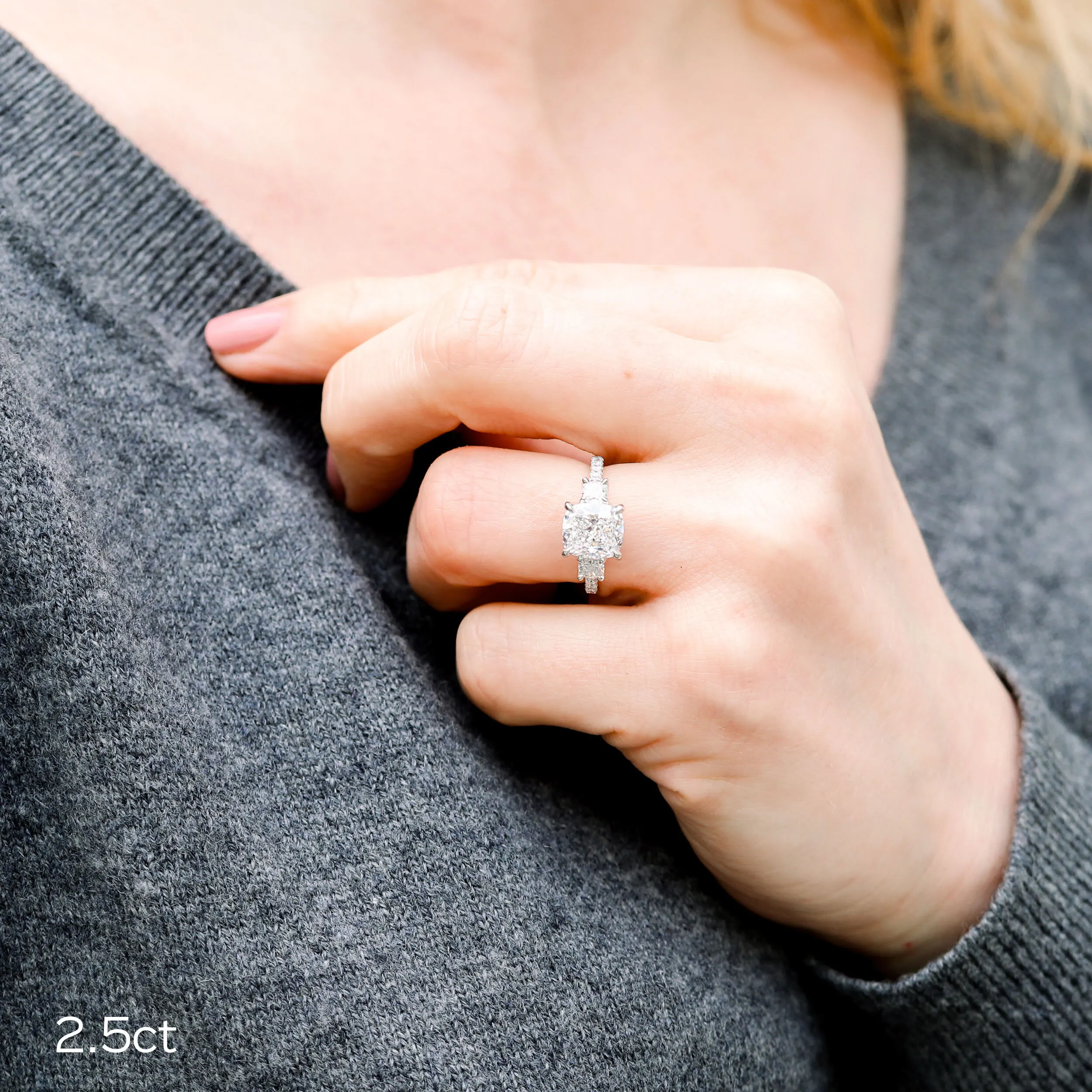 custom three stone pave ring with 2.5 carat lab grown cushion cut diamond center stone