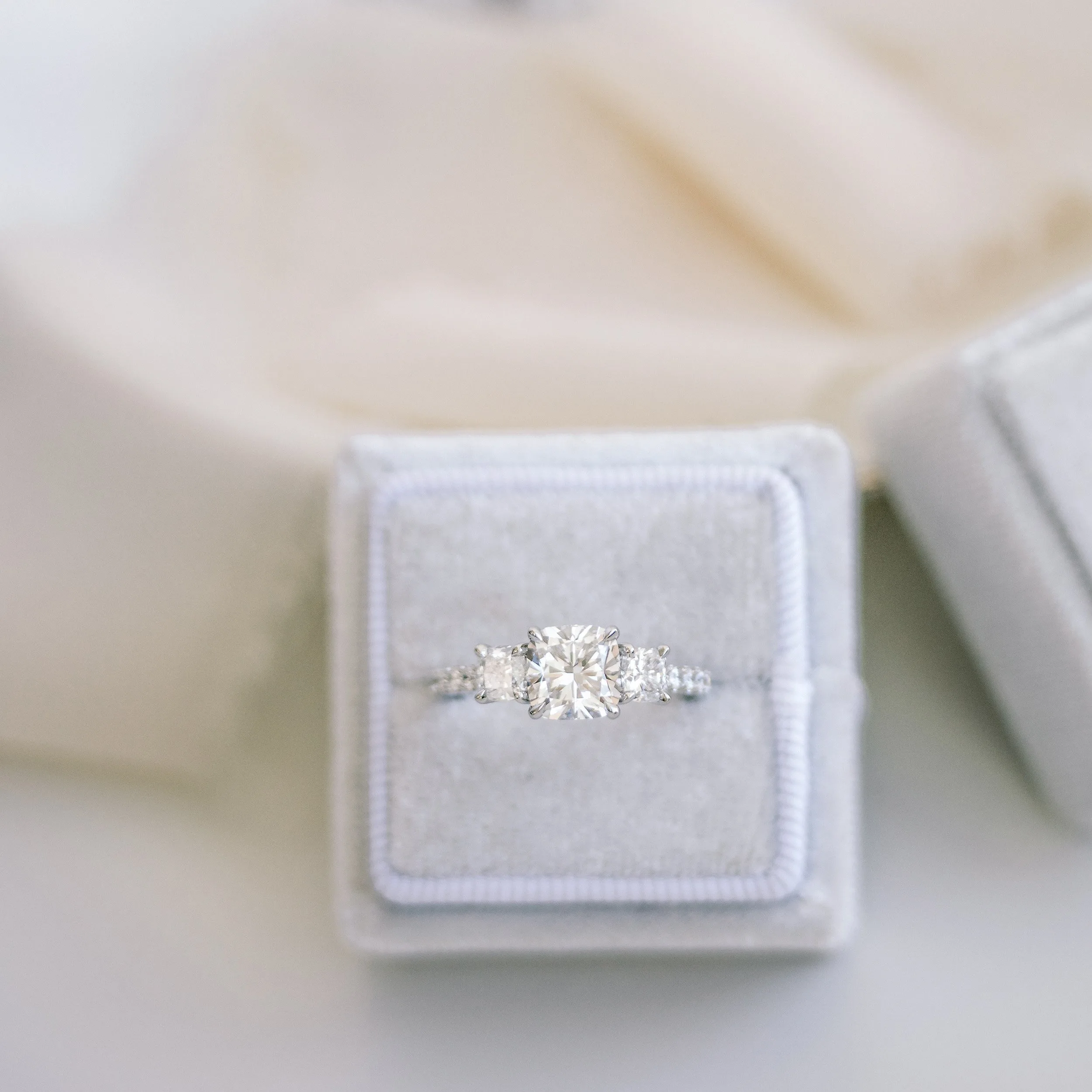 platinum 3 carat cushion cut lab diamond three stone ring with diamond band ada diamonds design ad 476 macro