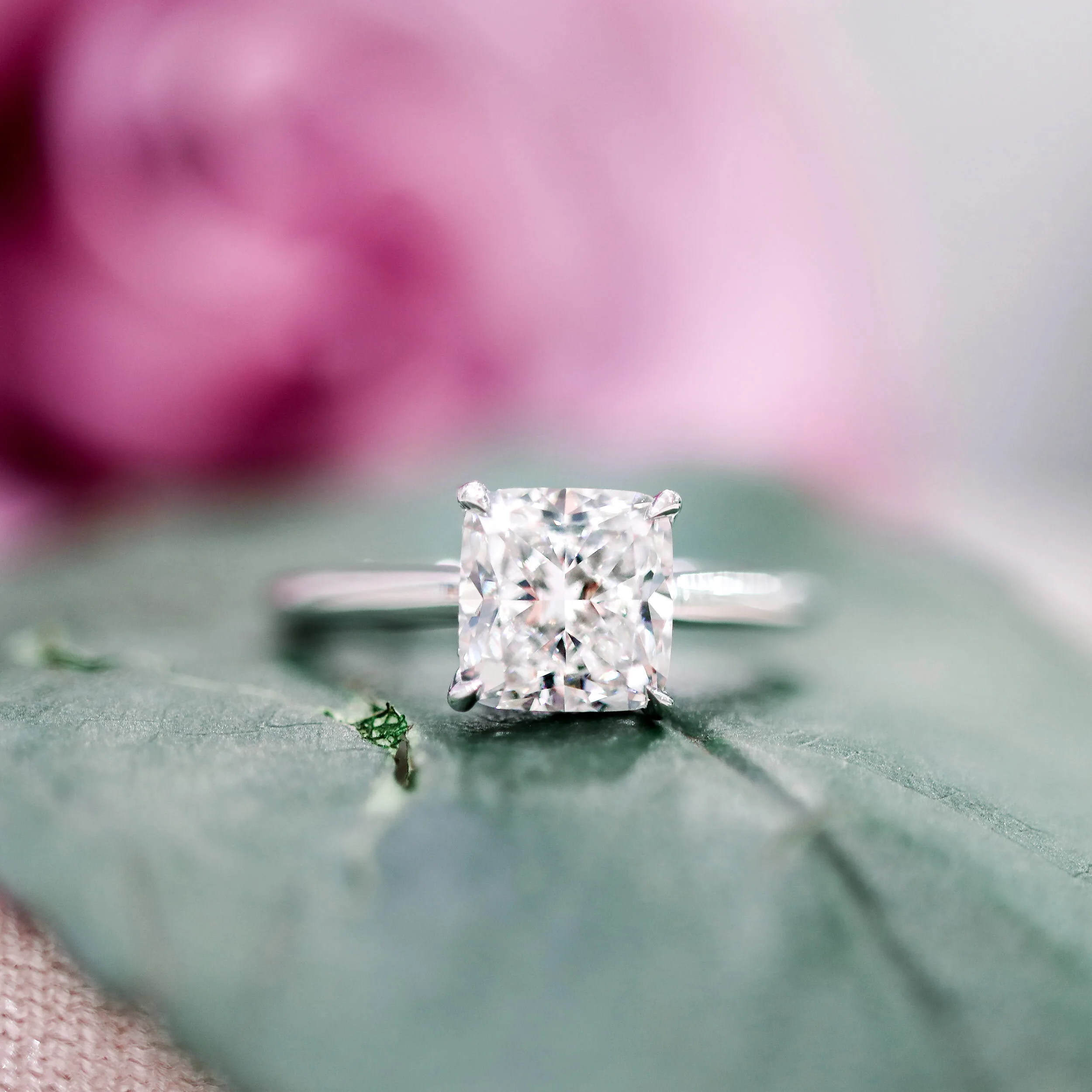 Platinum Cushion Trellis Solitaire Diamond Engagement Ring featuring High Quality 2.0 ctw Man Made Diamonds (Main View)