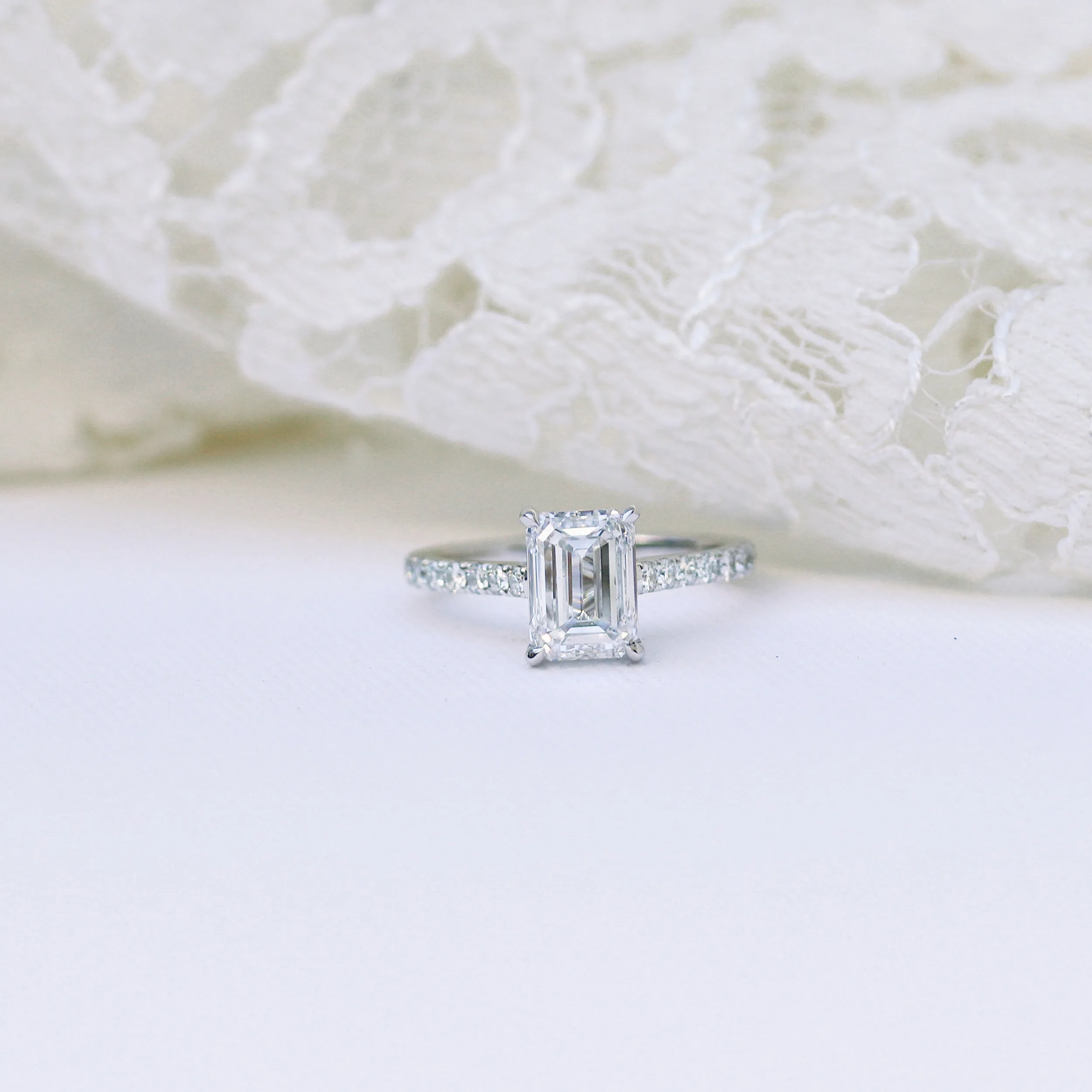 Platinum 1.75ct Emerald Cut Lab Created Diamond Ring with Pavé Band Ada Diamonds Design AD-352 Artistic Shot