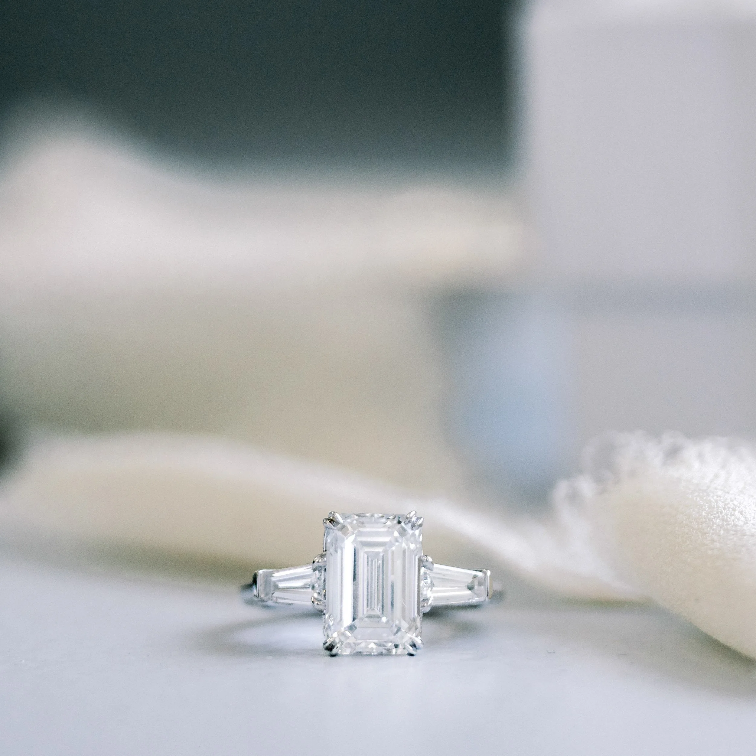 platinum four ct emerald cut lab created diamond engagement ring with baguette side stones ada diamonds design ad 464 macro