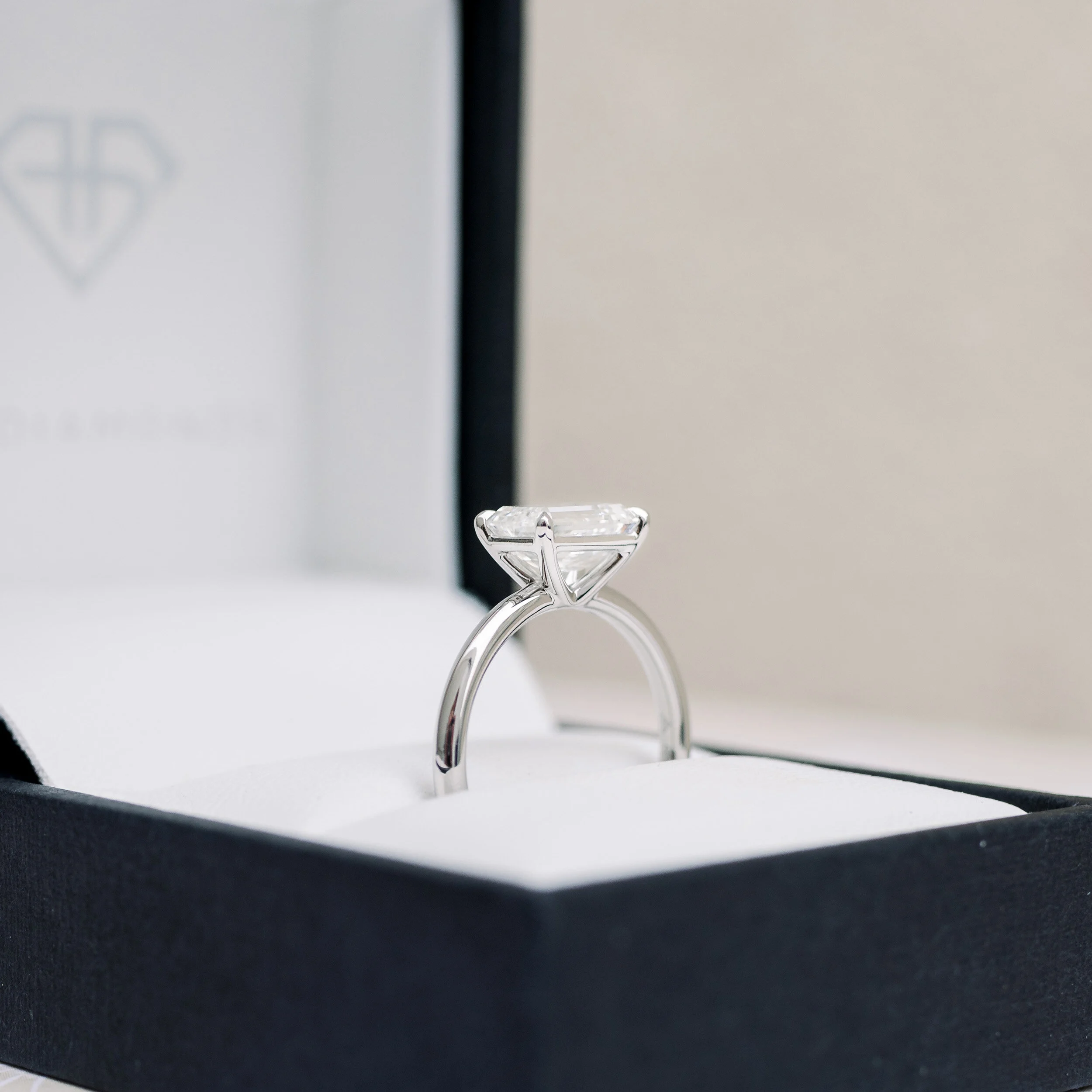 1.5ct emearld cut east west solitaire engagement ring in platinum ada diamonds design 337 profile