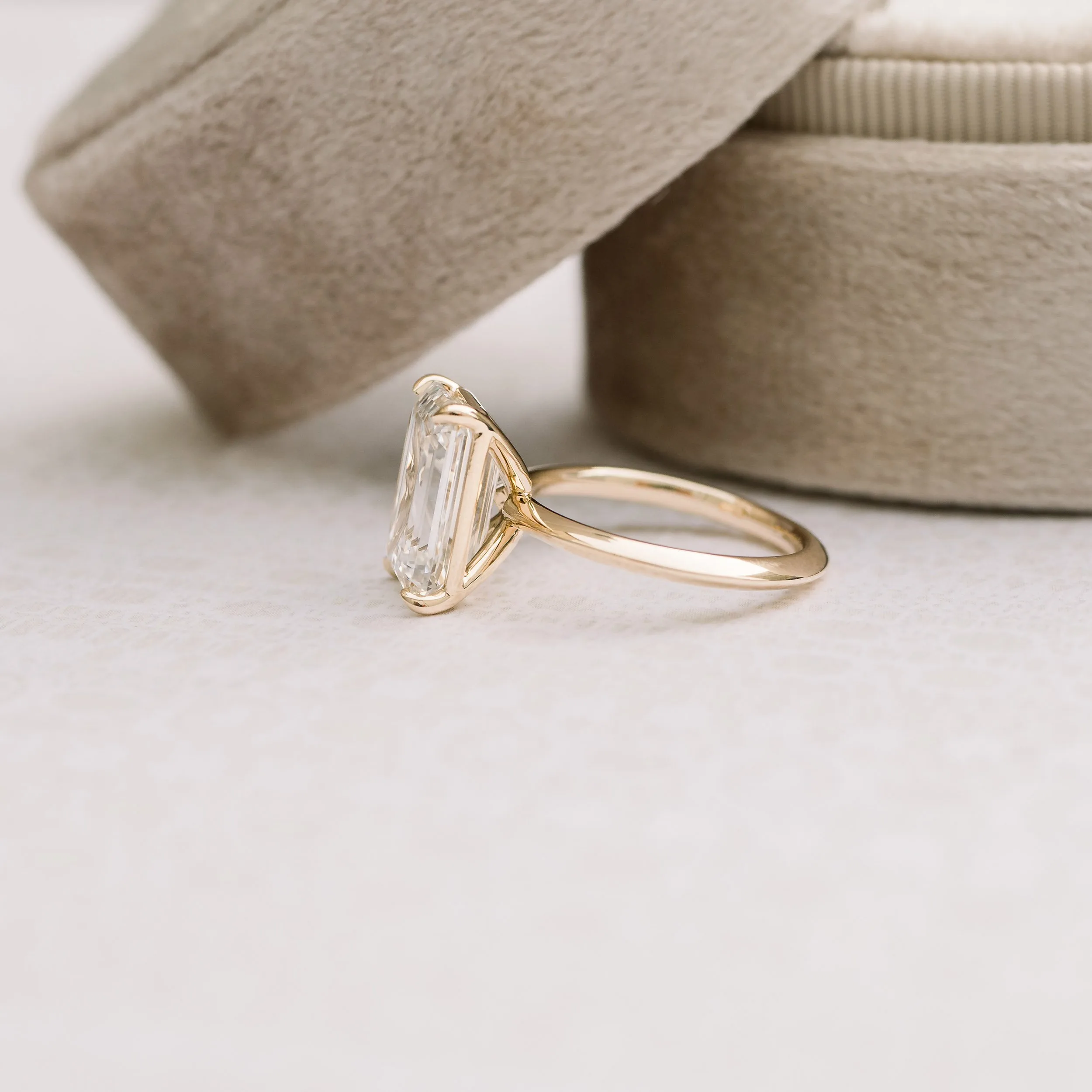 yellow-gold-solitaire-with-emerald-cut_1639956423439-8939J2JHOUB1ZQW2LPOD