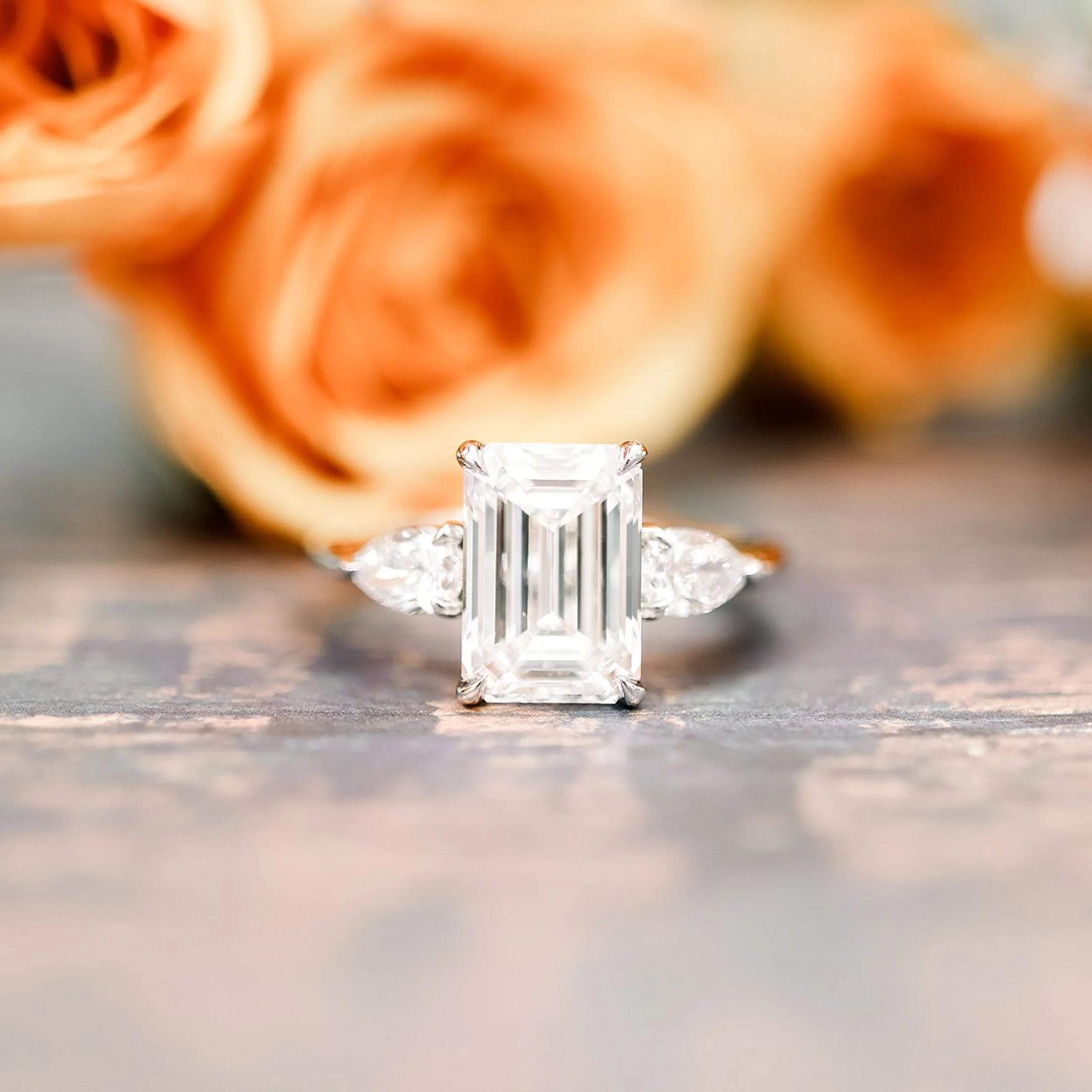 platinum 3.5ct emerald cut man made diamond engagement ring with pear side stones ada diamonds design ad 467