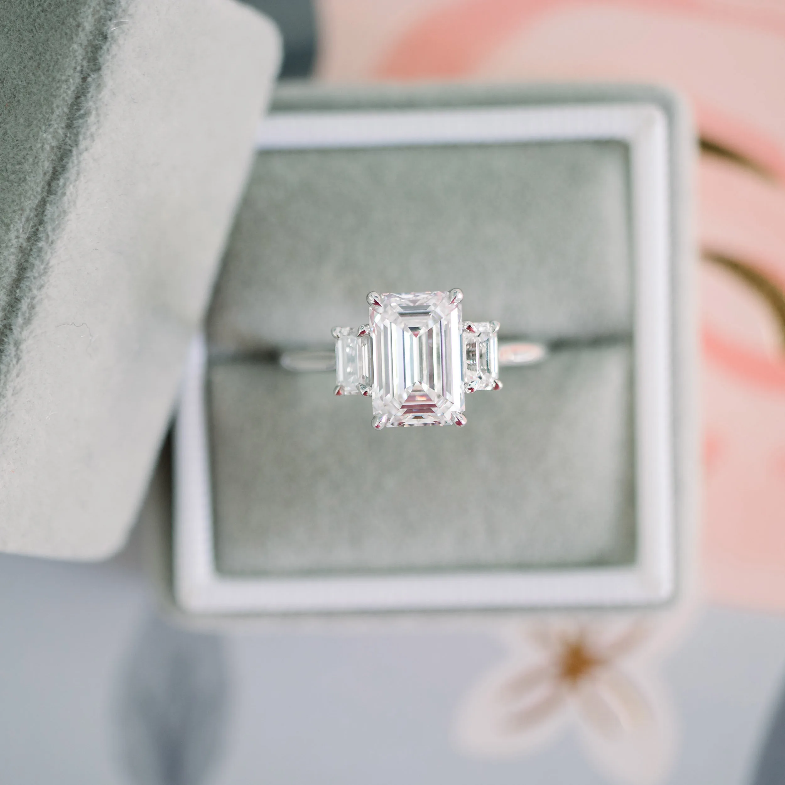 emerald three stone lab diamond engagement ring