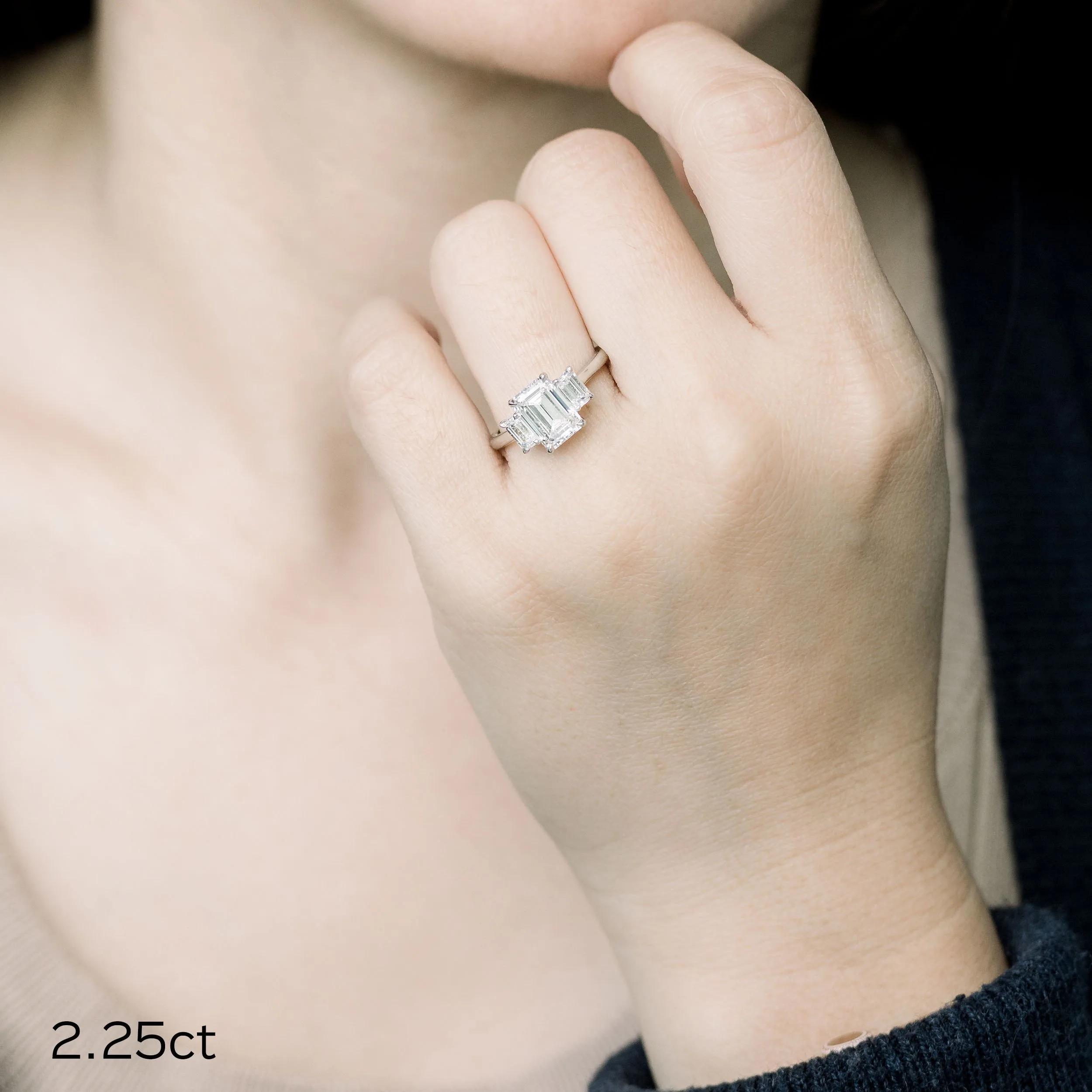 Platinum 2.25 carat emerald three stone lab diamond engagement ring with emerald side stones ada diamonds design ad-114