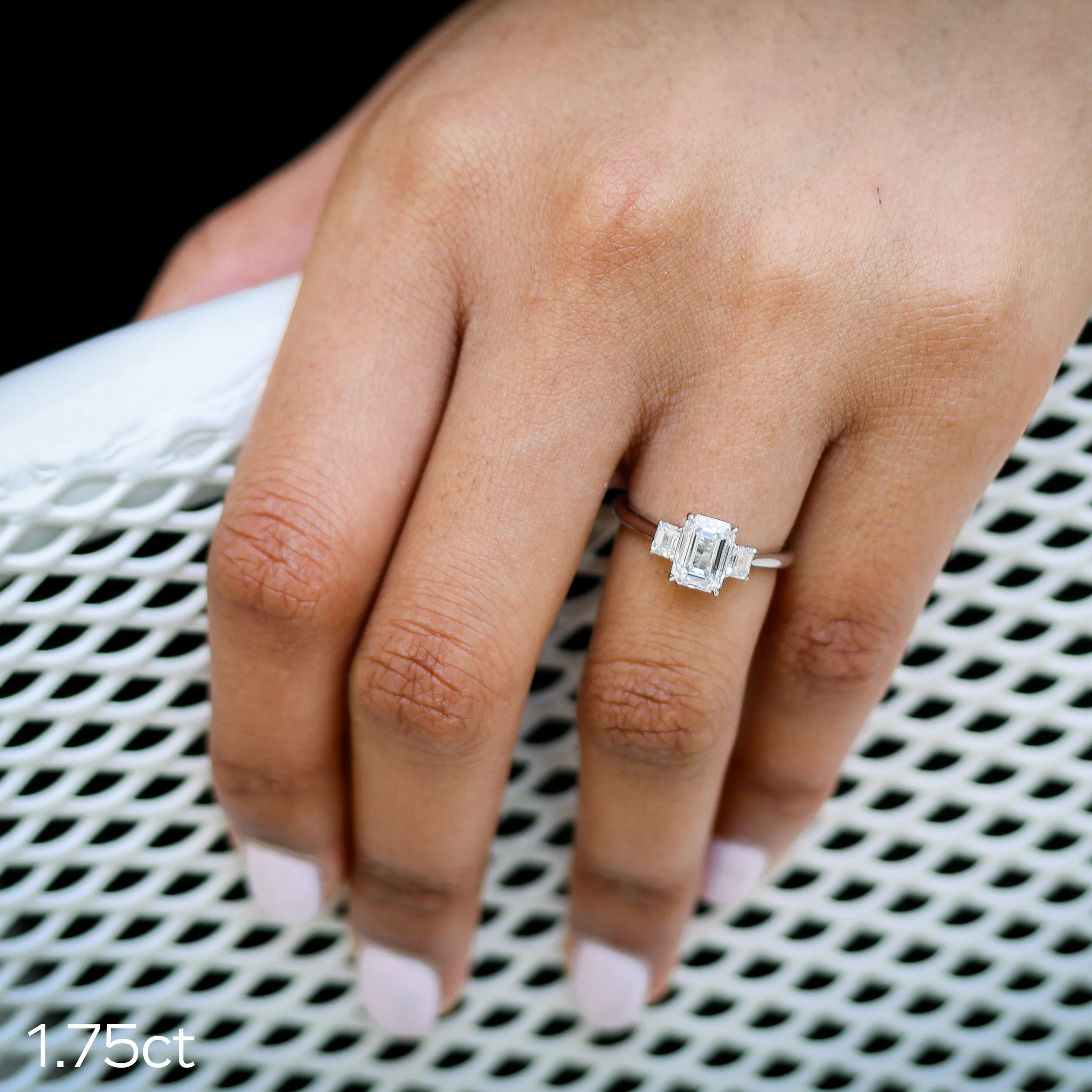 platinum emerald cut lab diamond three stone engagement ring