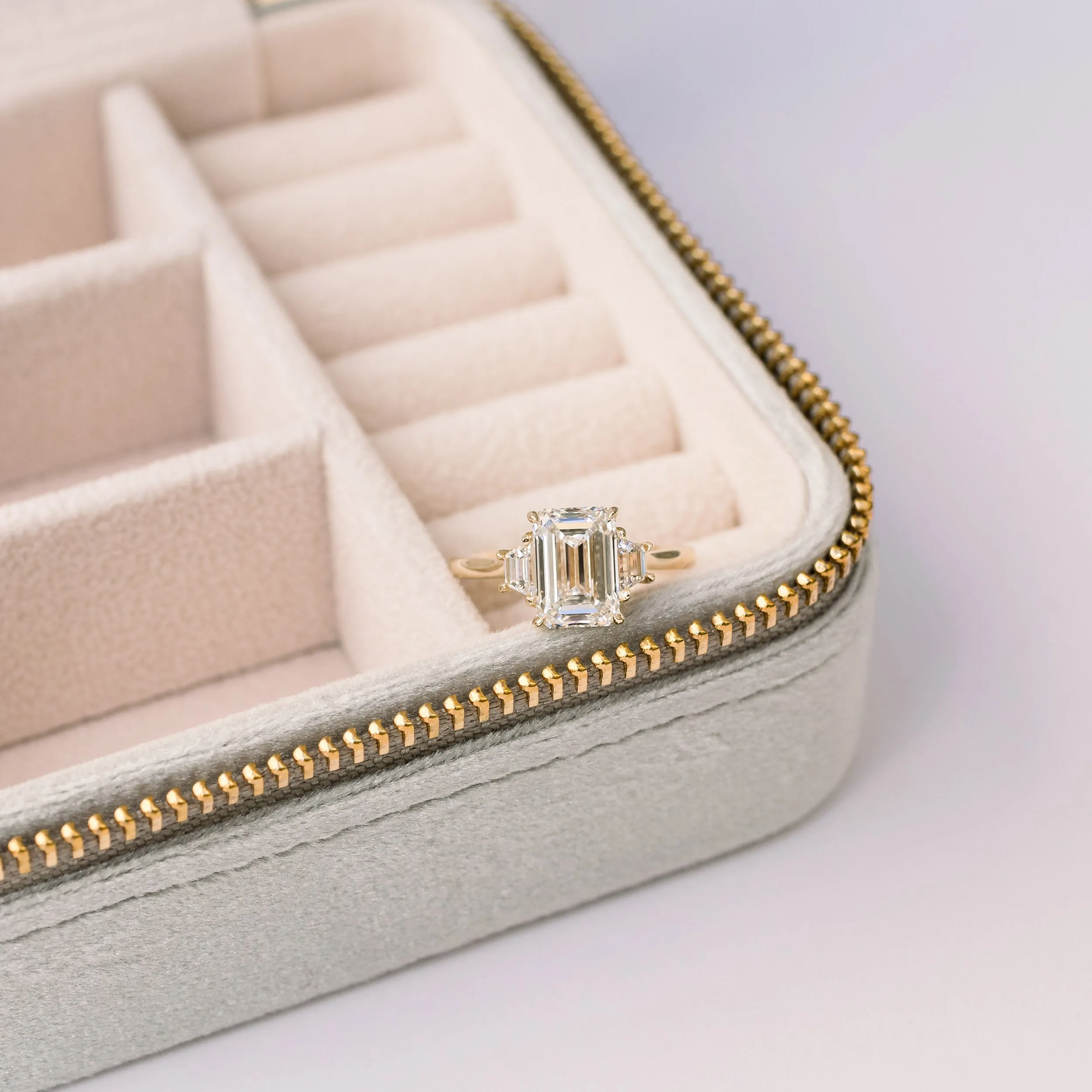 14k yellow gold 3 ct emerald cut lab diamond engagement ring with trapezoid side stones ada diamonds design ad 465 macro