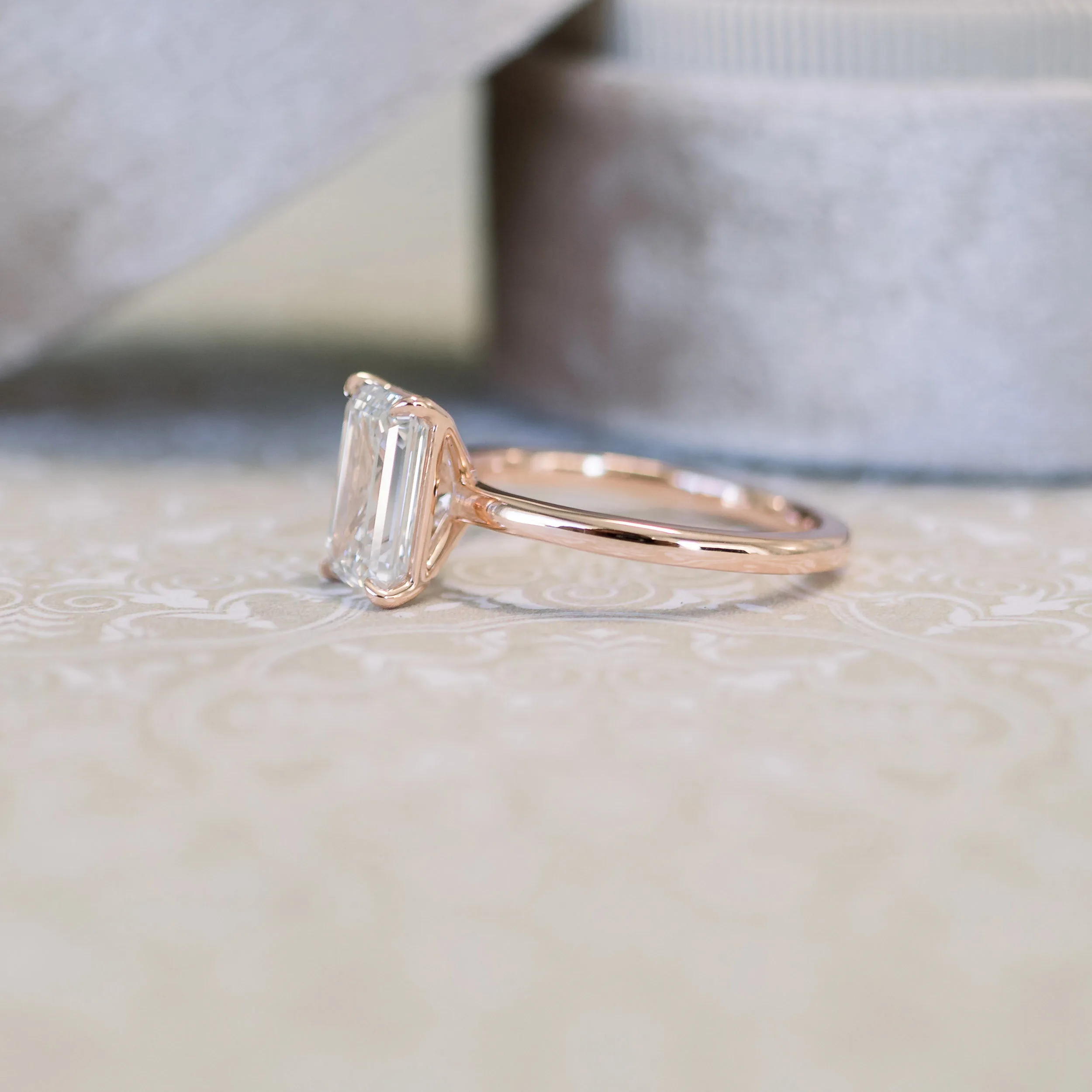 18k rose gold emerald cut solitaire engagement ring