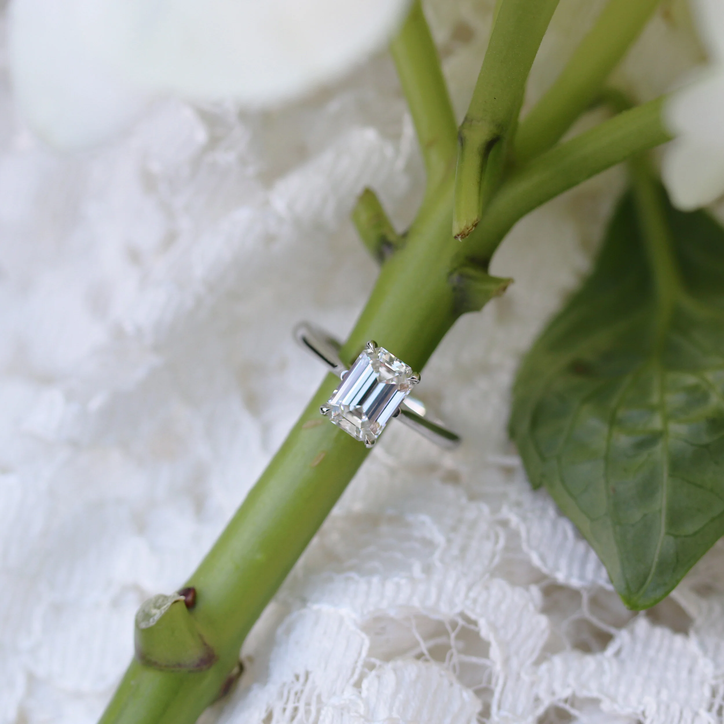 White Gold 1.5ct Emerald Cut Lab Diamond Trellis Solitaire Engagement Ring Ada Diamonds Design AD-330 Macro